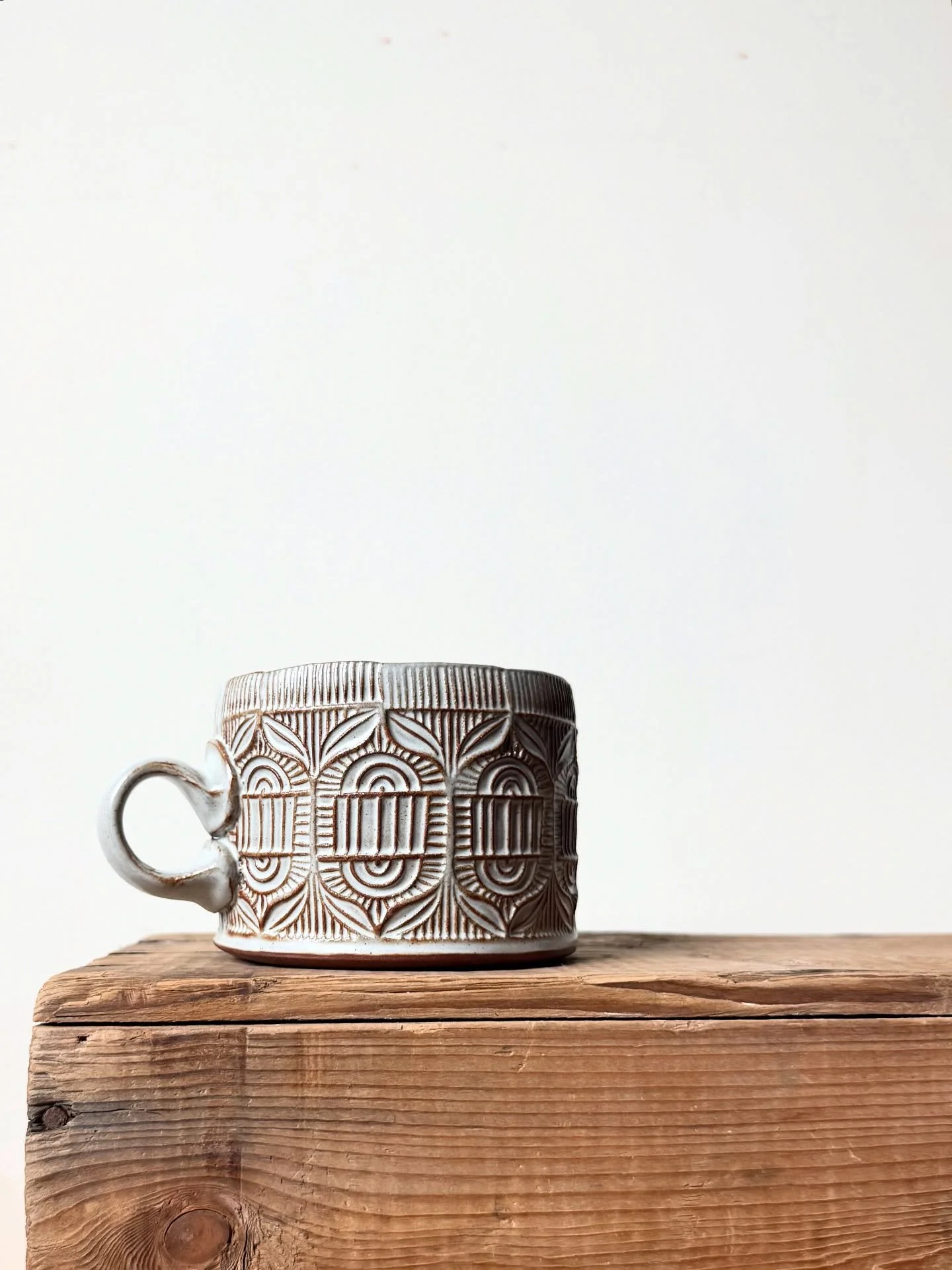 New clothes on this mug. Another kiln of tests out this morning. It might look like my old glaze at first, but the devil is in the details, and I&rsquo;m DEEP in those details right now, wrestling with some very pesky glaze demons.

Ok, so these are 