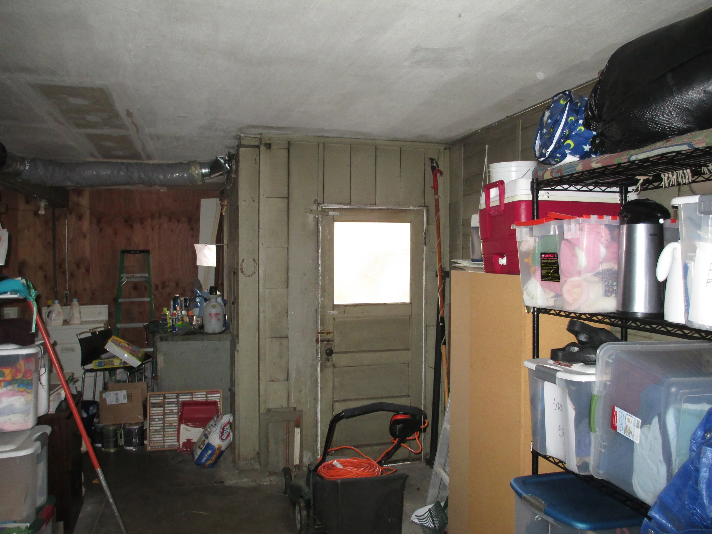 Garage level formerly used for storage.... see "after" photo below.