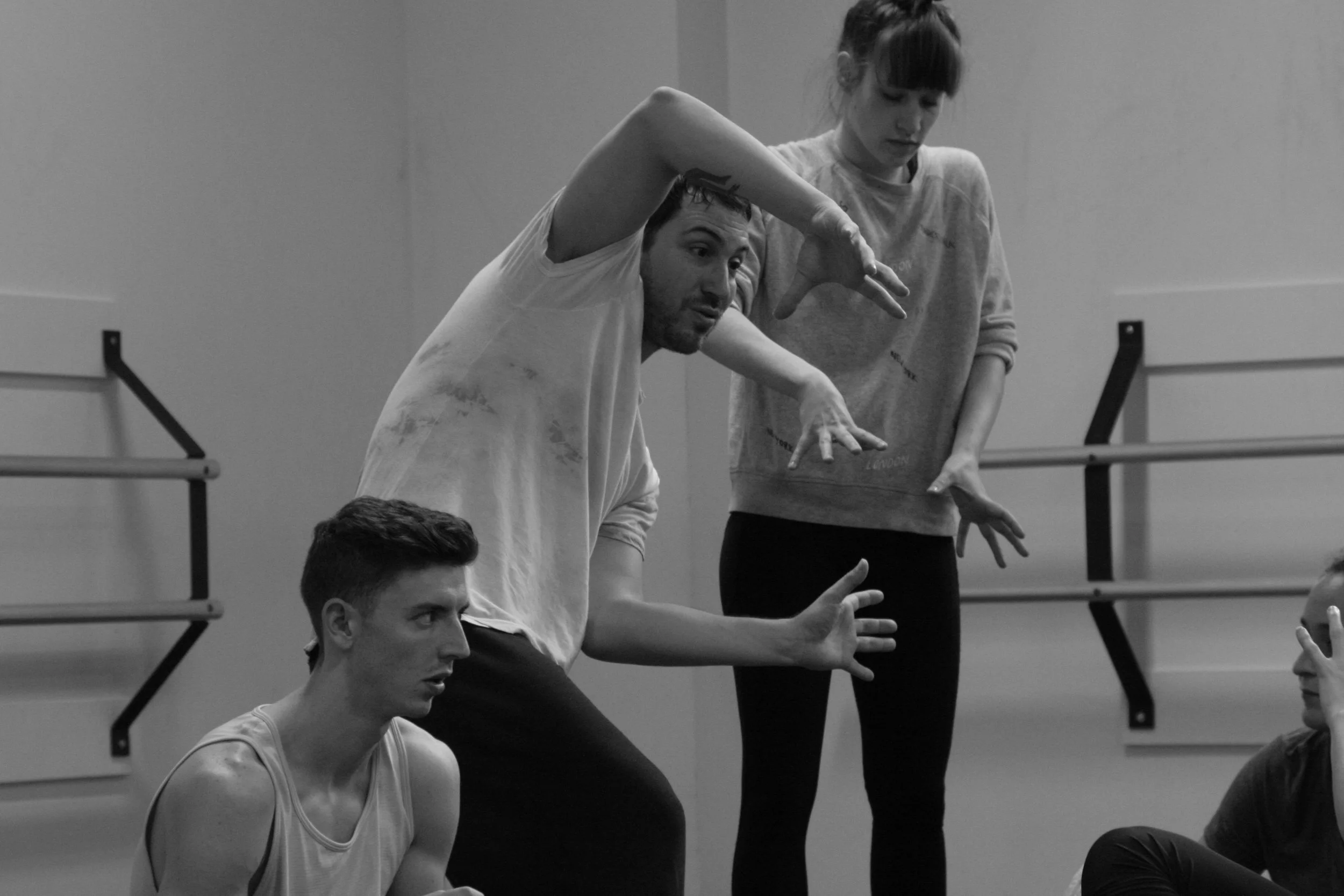 Gregory coaches dancers during rehearsal.
