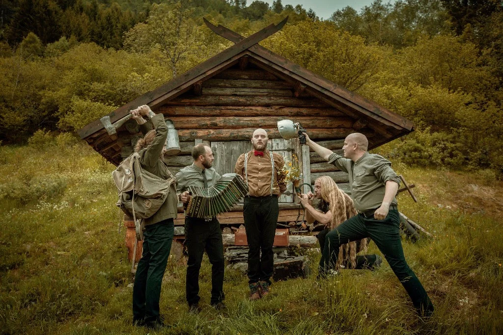 VULTURE INDUSTRIES are releasing a special 7" with the brand new track, "Deeper." You can listen to the offering HERE ! Front man Bjørnar comments on the track: "'Deeper' tells the story of man's insatiable greed for more, as symbolized by the miners digging all the way to Hell. Starting out with a haunting trumpet solo, the track mixes a Spaghetti Western vibe with the rhythmic and melodic drive of a large-scale rock opus. Musically, 'Deeper' nods in the direction of such diverse acts as Ennio Morricone, Type O Negative, The Beatles, and Lee Hazlewood, but at the same time there is also a solid dose of rock and metal, in the signature form of Vulture Industries. "It was one of those scorching summer days of 2018. The grass in the fields had all turned the colour of old paper, and the sun, at its zenith, was mercilessly searing our skin. Thirsty, hungry, and with tongues swelling, we had just missed the ferry crossing and could taste our hopes turn to ashes in our mouths. Trying to remain calm, but steadily feeling the building pressure of desperation, as a boiler ready to blow, we waited in line. Then suddenly the one year old in the back seat broke the silence chanting AHUM, AHUM, AHUM, AHUM! Overcome by what felt like divine inspiration but might very well have been sent from the depths of Hell, I started drumming on the dashboard. DUM, DADADUM, DADADUM, DADADUMDADUMDADUM." In addition to the single release, VULTURE INDUSTRIES will also be embarking on a tour this spring. The full itinerary is as follows: VULTURE INDUSTRIES Euro Tour (w/ HELHEIM +MADDER MORTEM): 04/25: Bucharest (RO) @ Quantic Club 04/26: Cluj Napoca (RO) @ Flying Circus 04/27: Budapest (HU) @ Voros-Kek-Yuk 04/28: Praha (CZ) @ Nova Chmelnice 04/29: Paris (FR) @ Backstage 05/01: London (UK) @ The Underworld 05/02: Hamburg (DE) @ Logo 05/03: Esbjerg (DK) @ Konfus 05/04: Dresden (DE) @ Skullcrusher 06/01: Oslo (NO) @ John Dee VULTURE INDUSTRIES are touring in support if their latest full-length, 'Stranger Times,' which is streaming in full HERE ! It can be purchased HERE . The metal scene seems mired in stagnation all too often these days. The tenth edition of the great thrash revival, the never-ending race to be more brutal or more technical or more dissonant in death metal, and the rampant nostalgia of an ever-aging scene do not provide the necessary ingredients for progress and out of the box thinking. That is the very reason why rare bands such as VULTURE INDUSTRIES are so important. The Norwegians' fourth album 'Stranger Times' continues and expands the band's quest to push the limitations of genre and sound. Their nine new tracks are as easily as masterfully spanning a wide range from dark rock to progressive-experimental metal, while keeping their wild roaming within the boundaries of the band's unique and bizarre sonic universe. Yet VULTURE INDUSTRIES manage to harness their bold mix into recognisable structures and meaningful songs throughout that do not shy away from catchiness and, quite importantly, do not fall into the trap of being weird just for the sake of experimentation. VULTURE INDUSTRIES have emerged from the vibrant rock and metal scene of Bergen, the unofficial capital of Norway's west coast. Mostly associated with black metal, its rich music sphere in fact covers bands from all styles and directions. VULTURE INDUSTRIES drew inspiration from diverse acts such as FAITH NO MORE, MR. BUNGLE, ARCTURUS, DEVIN TOWNSEND, VED BUENS ENDE and THE CULT, when they started out under the DEAD ROSE GARDEN moniker in 1993. After several line-up changes, the new name VULTURE INDUSTRIES was adopted in 2003 and two demo releases quickly followed - 'The Sleeper' (2003) and 'The Enemy Within' (2004). Having stirred considerable interest in progressive circles, it was time to present their first official recording with the EP 'The Benevolent Pawn' (2005). Consisting of current and former members of SULPHUR, BLACK HOLE GENERATOR, MALICE IN WONDERLAND, and SYRACH, VULTURE INDUSTRIES shouldered their way past the then-inactive ARCTURUS and the drifting ULVER towards the throne of Norwegian dark progressive metal with their two albums 'The Dystopia Journals' (2007) and 'The Malefactor's Bloody Register' (2010). The eclectic band from Bergen was more than ready to engage with avant-garde metal fans worldwide, which their next full-length 'The Tower' aptly proved in 2013. This release saw expanded touring and more performances at prestigious festivals around the globe. Now VULTURE INDUSTRIES are presenting their most concise and compelling output so far. 'Stranger Times' is made out of hard-won experience and burning passion. Tune in, zone out, and enjoy! Line-up Bjørnar E. Nilsen: vocals, percussion & keyboard Øyvind Madsen: guitars Eivind Huse: guitars and vocals Kyrre Teigen: bass and vocals Tor Helge Gjengedal: drums For more on VULTURE INDUSTRIES , visit their official FACEBOOK , WEBSITE , and TWITTER . For more on SEASON OF MIST artists, visit our official WEBSITE , FACEBOOK , INSTAGRAM , YOUTUBE , and TWITTER .