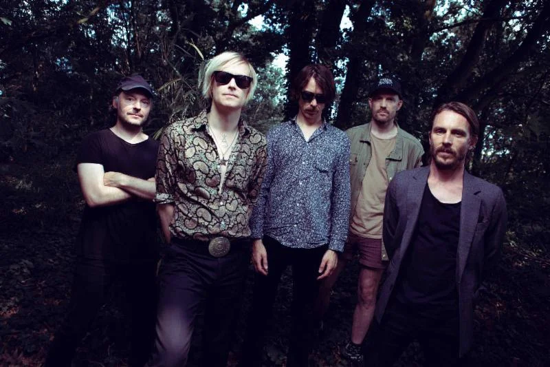 Capturing both their ethos and the spirit of their explosive live show, Refused have released " Blood Red ," the first single off their upcoming album War Music, which will be released globally via Spinefarm/Search & Destroy on October 18 . The album is available for pre-order HERE . Blending the musical and political passions that have helped the band rise to near legendary status since their founding in 1991, the accompanying music video showcases the band's roots in early '90s Umeå, Sweden juxtaposed against the present day, making it clear that the dynamism that brought the band to international prominence shows no sign of slowing down in 2019. Everything " Blood Red " can be found HERE . "We didn't play a single show during the making of the last album. It was a long time to be away after the addictive chaos of our reunion shows in 2012. Playing to houses packed with maniacs losing their minds right in front of you is a narcotic to rival actual narcotics we'd venture. (Not our field of expertise, but Keith Richards definitely seems to feel that way, and he's an expert on both.) So as we went out on tour in the summer of 2015 we were getting pretty high on our own supply (of songs that is). It was amazing, simply put. But it was also obvious that " Freedom " was, for the most part, a studio record. A great record, to us, but there was something missing as we started playing it live - something visceral, direct, relentless. At a soundcheck somewhere on the road (Austin?), Kristofer started playing this riff and we all got into it (jamming, as it were). After a while we noticed that our crew had stopped working and that the people working at the venue were standing around watching us play. Now, people at venues usually hardly notice you, they've seen a thousand bands more famous than you fool around with their precious ditties as they're re-stocking the bar or setting up barricades. So as we were settling into the riff proper and it started rolling and bouncing the way you're hearing it today, whatever we felt had been missing, it was clear that we had begun to fill that gap. The riff turned into ‘ Blood Red ’, the first song we finished for the new record and the first song we played live off of it. It's fitting that it's now the first song you're gonna hear from the new record because it was truly inspired by you, our live audience, the old and the new, who come out and help us turn every venue into a boiling hot mess. This one's for you. If I fall, you'll help me up, ok? Welcome to " War Music ." We'll see you in the pit." //Refused ABOUT REFUSED: Formed in Umeå, Sweden in 1991, hardcore-punk legends Refused are one of the most influential rock bands of the early '00s. Artists as diverse as Linkin Park, Frank Turner, Steve Aoki, Duff McKagan, and Paramore have been heavily cited crediting the 1998 album The Shape Of Punk To Come as being a fundamental influence on their musical styles. That album has become a cultural touchstone for the entire post-hardcore generation as the year zero of stylistic genre-bending — utilizing electronics, jazz and slick production for the first time – their reputation tent-poled by politically radical lyrics and solidified by their energetic live shows to spread their message. After a 14-year pause, the band reunited in 2012, playing much anticipated shows like mainstream festival Cochella and were subsequently awarded the "Special Prize for Music Exports" by the Swedish Ministry of Trade in 2013. In 2015, they released their fourth studio album Freedom, which was recorded with Nick Launay (Nick Cave and the Bad Seeds, Killing Joke), while also turning to Swedish pop/producer Shellback — whose credits include Taylor Swift and Britney Spears — for the lead single "Elektra." Out October 18, " War Music " will be their fifth full-length studio album and will be accompanied by a worldwide concert tour, which began in May 2019 with a U.S. tour with The Hives and three major European music festivals in June.