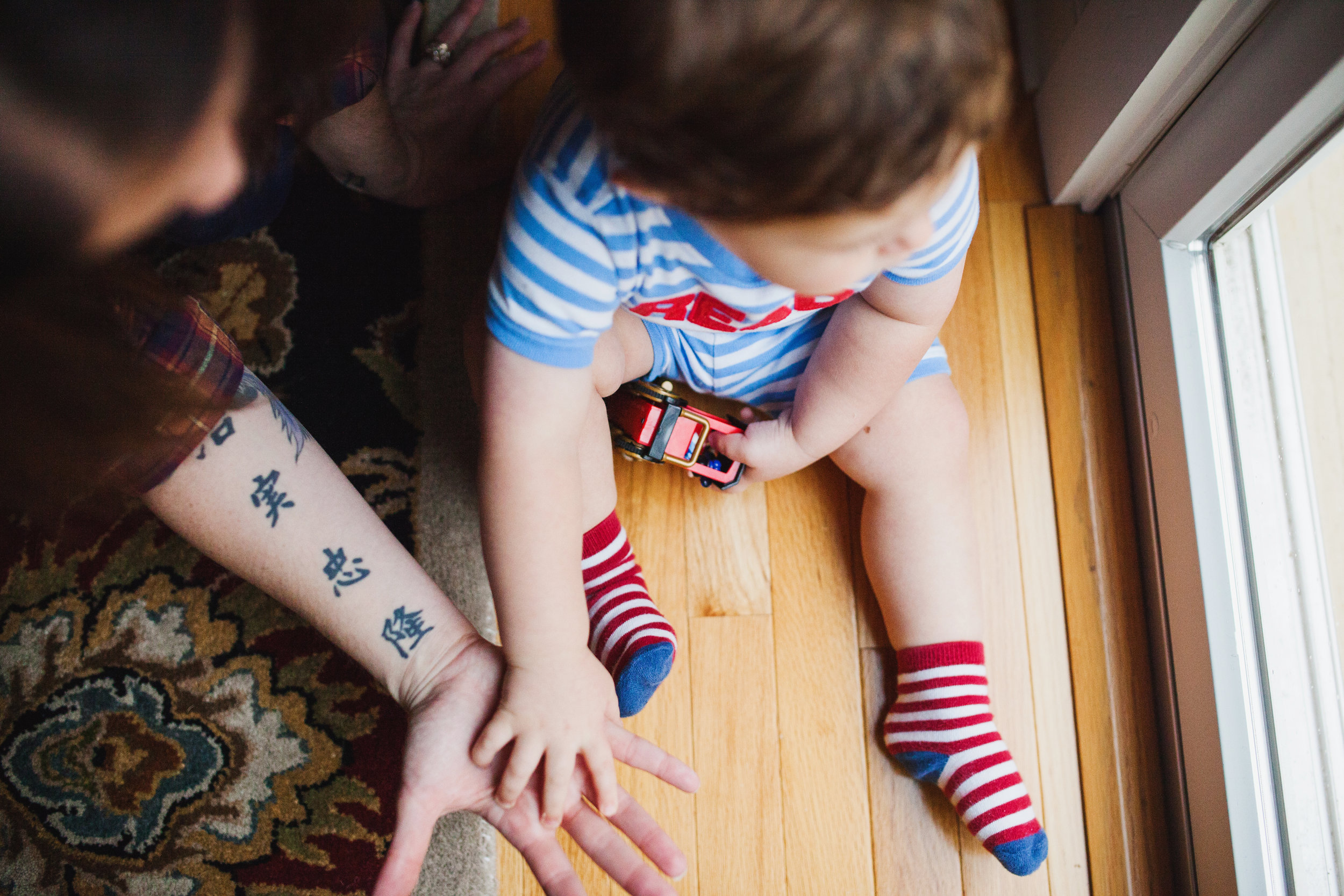 Toddler in striped socks Audrey Blake Photography.jpg