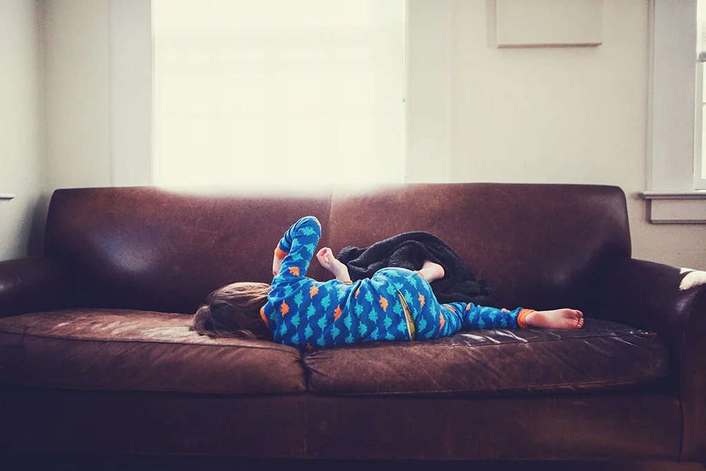 Child on sofa Audrey Blake Photography.JPG