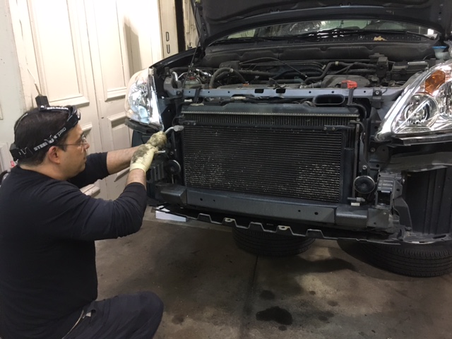 Our certified, experienced technician installing new headlight lens