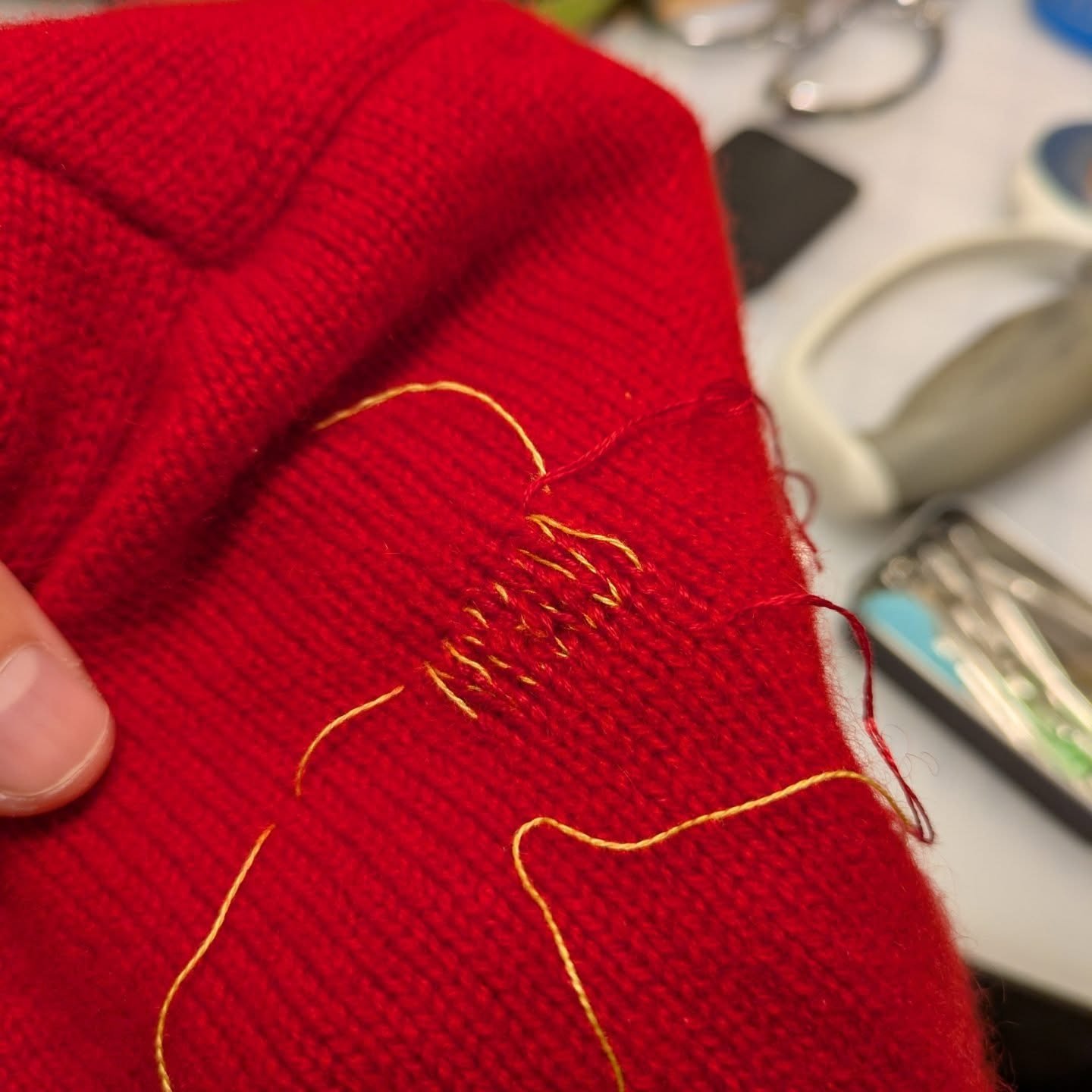 🪡 100 Days of Mending: Day 74: Swiss Darning a red sweater

Stay tuned for future Swiss darning workshops! If you want me to fix your sweaters, drop in any time we&rsquo;re open at @ProductionMode, 12-6pm, Wednesday-Sunday, or send me an email with 