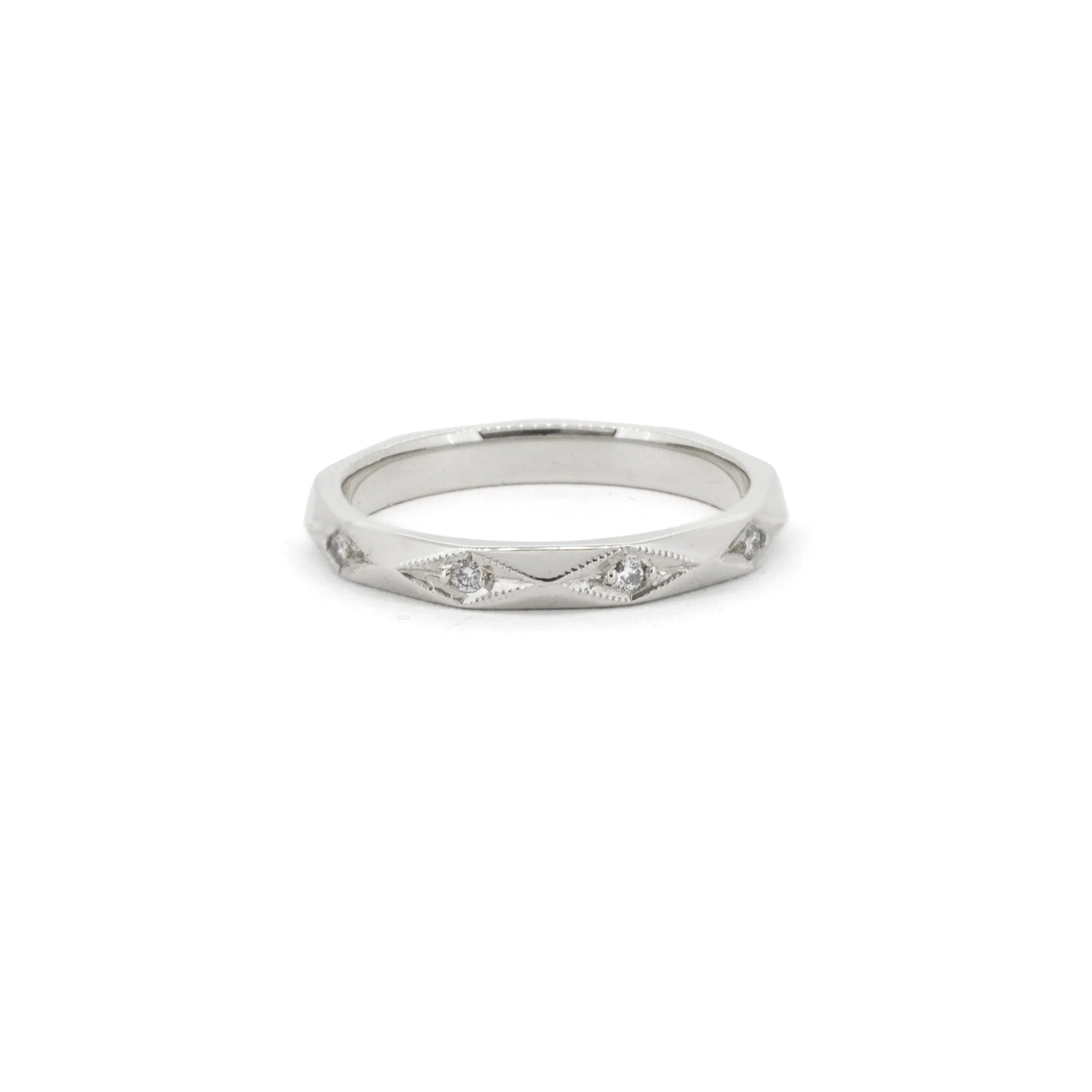 Diamond-Facet-Wedding-Ring-WG.jpg