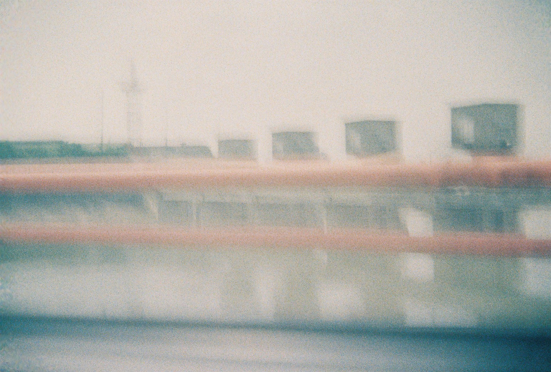 Because I suck at following instructions, I tried to take a photo of the Manggahan Floodway while riding a cab.