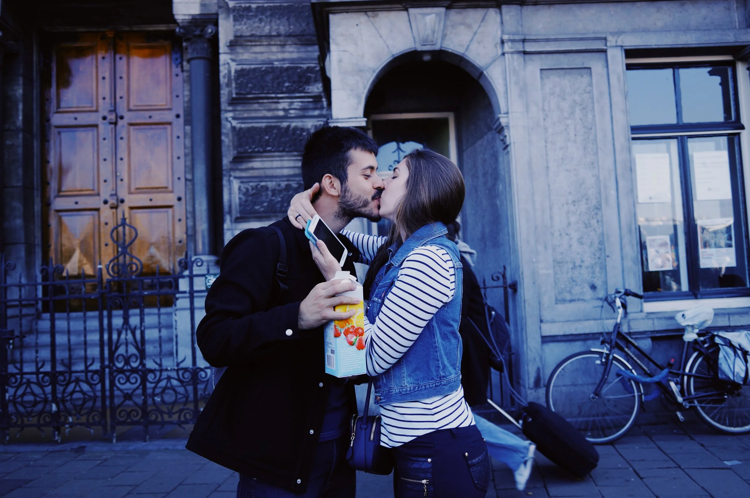 Amsterdam is a very crowded city especially on the weekends. What I love about this photo is how they are kissing like they were the only people in the world.