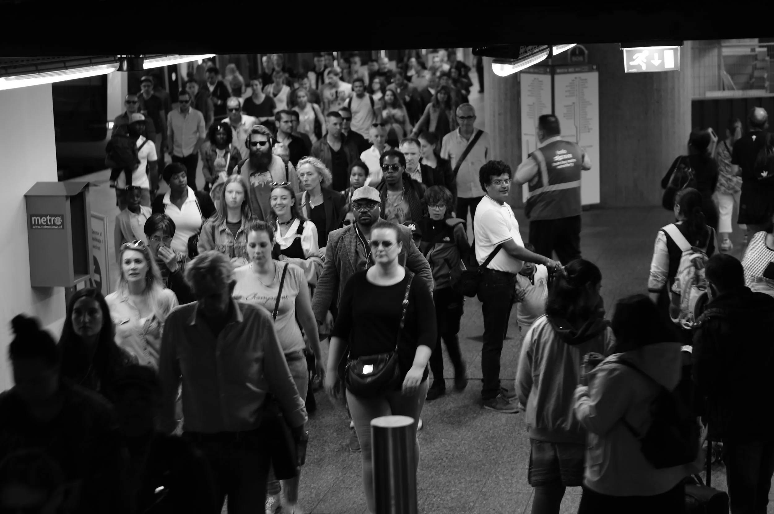 This is such a noisy photo taken from Amsterdam Centraal. I love that from this crowd, there's one guy who's looking straight at my camera.