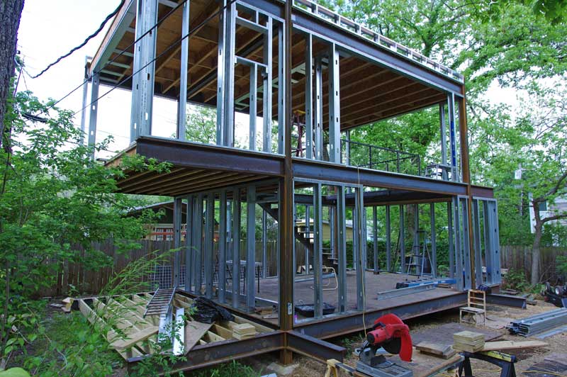 Upper 'clean' studio will have two large 12' x 8' glass walls; one looking out to the East and one looking West into the heart of the studio.