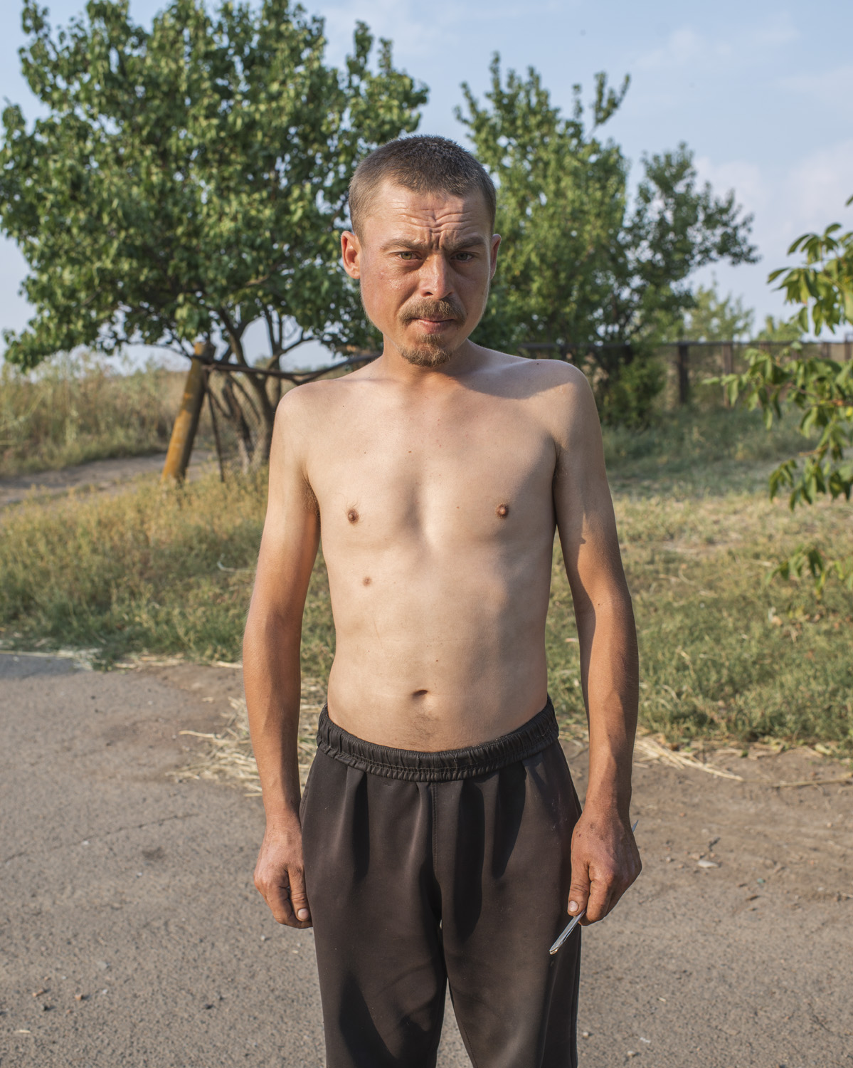 Leonid, 26, Anatol. "If the shelling comes here we can do nothing, it's heavy artillery you can't really hide."