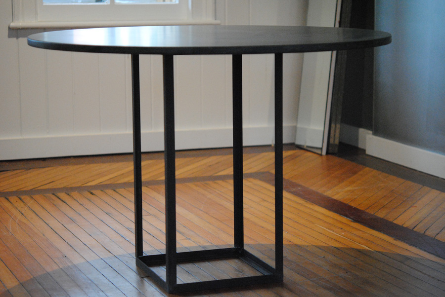 Open square base with granite top dining table