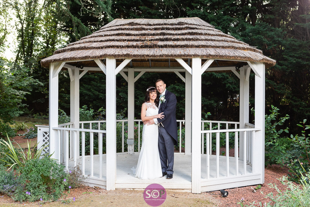 bride and groom in the wedding pavilion at the iliffe, coventry