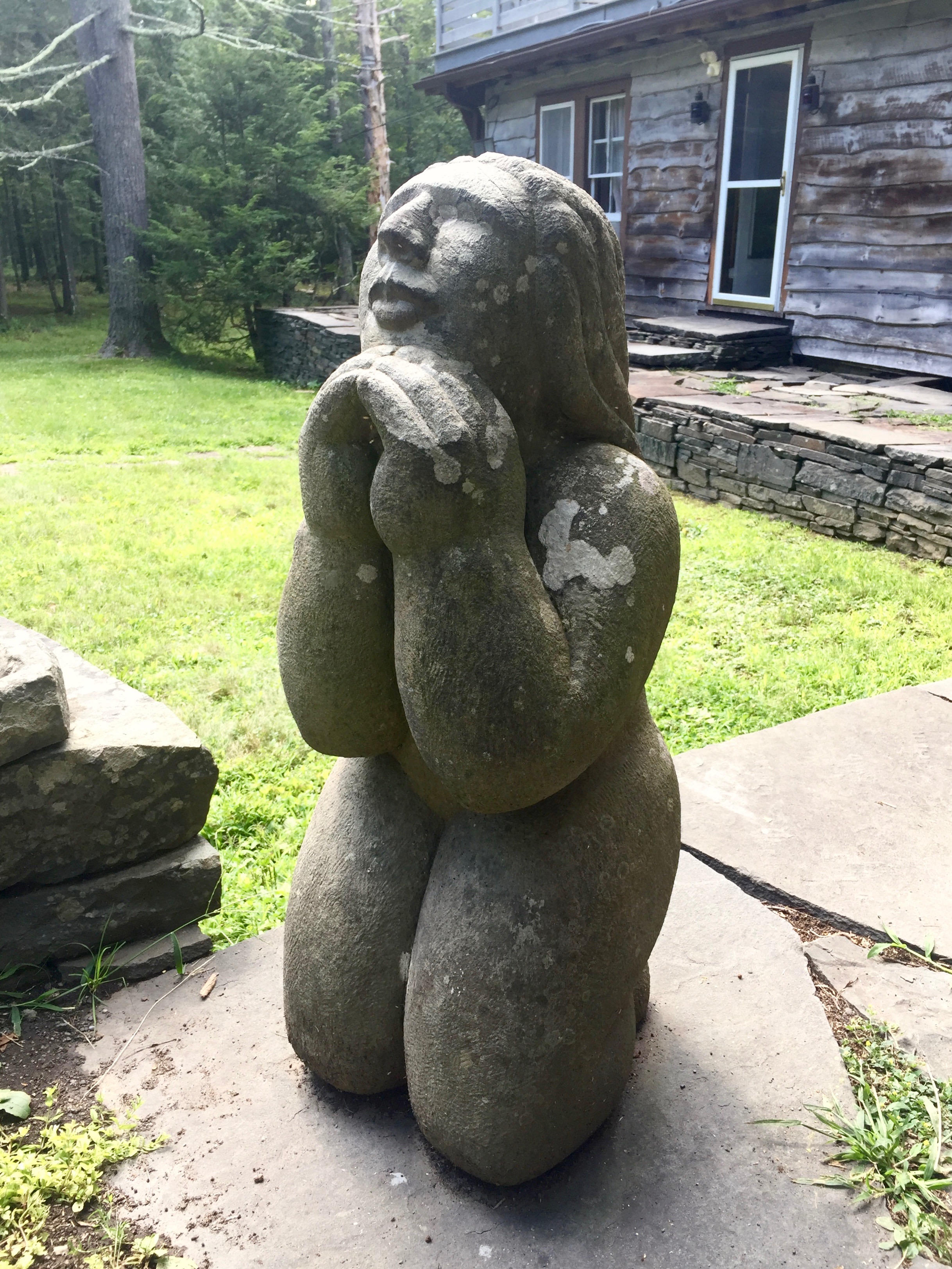 Opus 40 kneeling statue