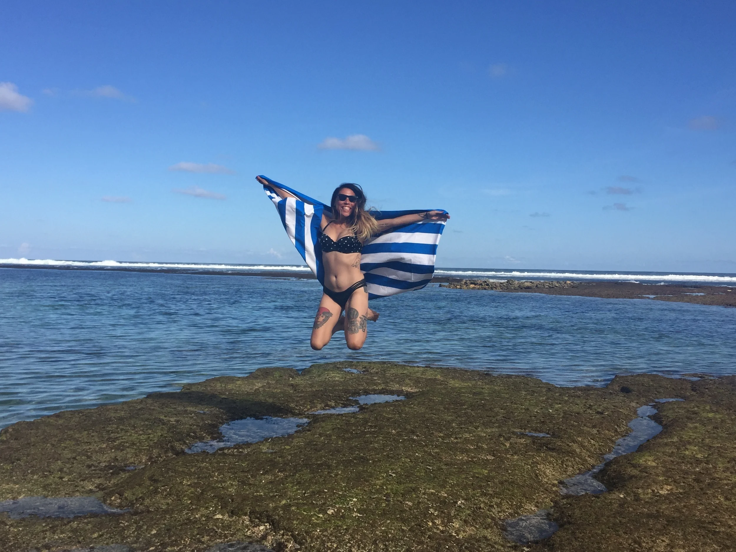 Jumping for joy with my Dock & Bay beach towel! 