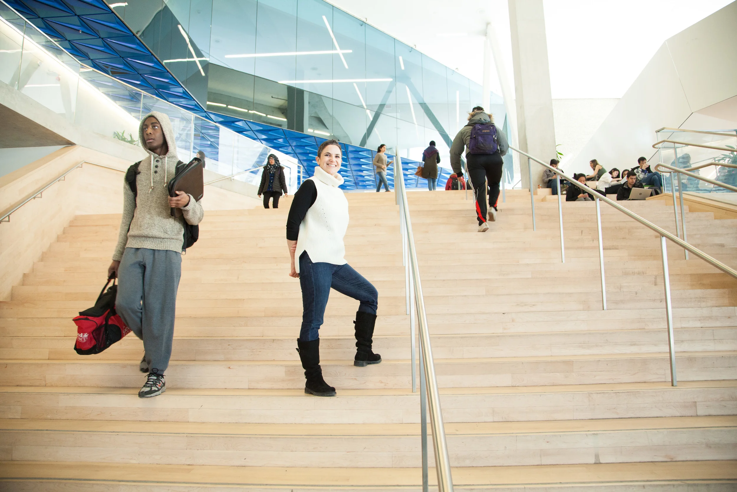 Taking the stairs up to the second level. I absolutely loved the use of wood here!