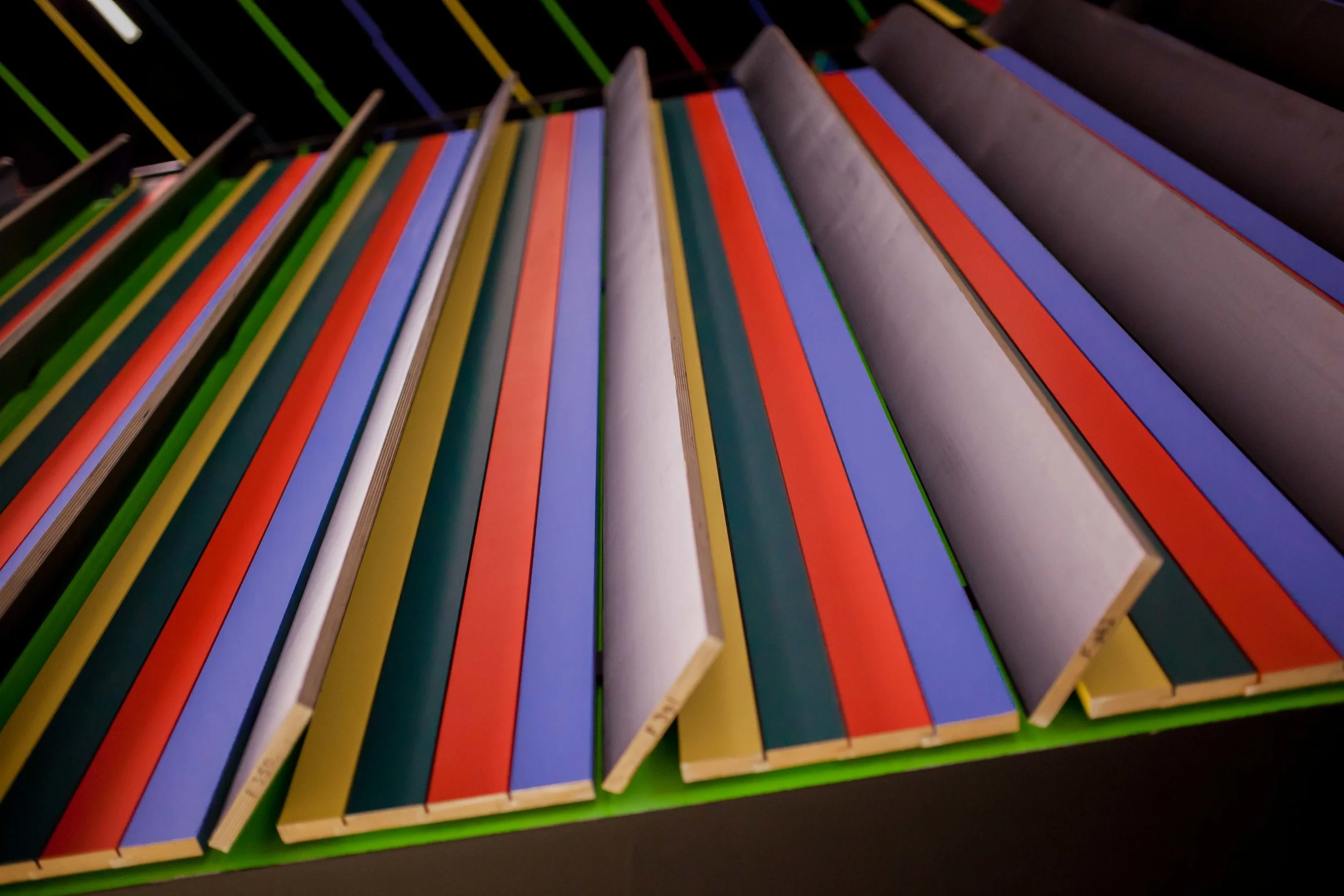 The panelling in the auditorium is a neat array of colours.