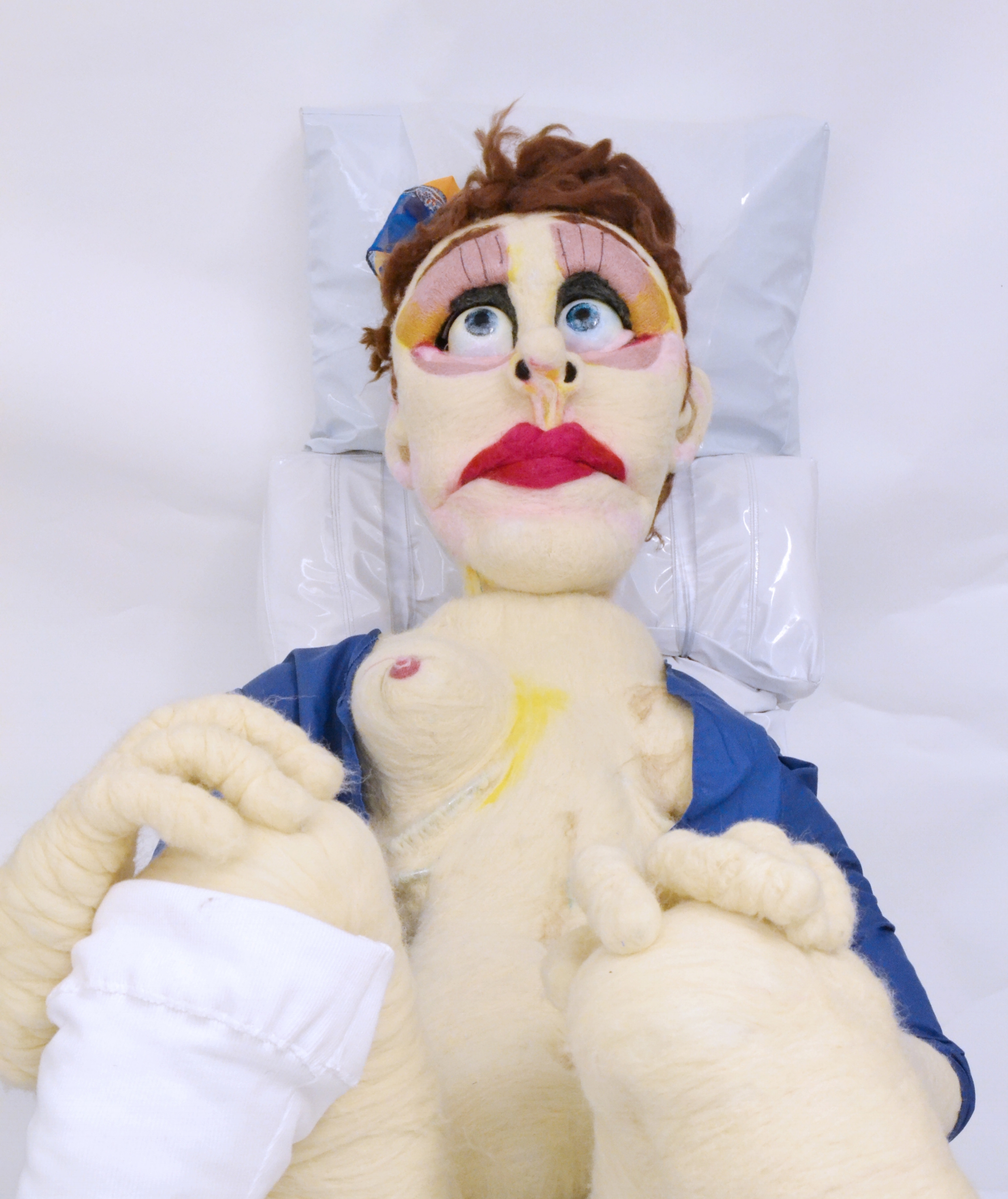  Hand puppet, life sized scale that is puppeteered from the back of the head.&nbsp;  Eyes are functional (blinking mechanism) and made from wax.  Medical robe and socks are machine sewn.&nbsp;  While this puppet is not featured in the animation, she 