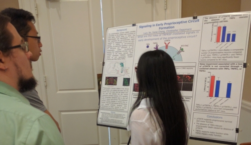 Lucy J (right) at the 2016 Pizza, Posters, and Presentations Fair. Austin and unidentified man on the left.
