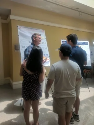 Parks captivating his audience which includes Lucy J, Kelvin, and unidentified man (left to right). 