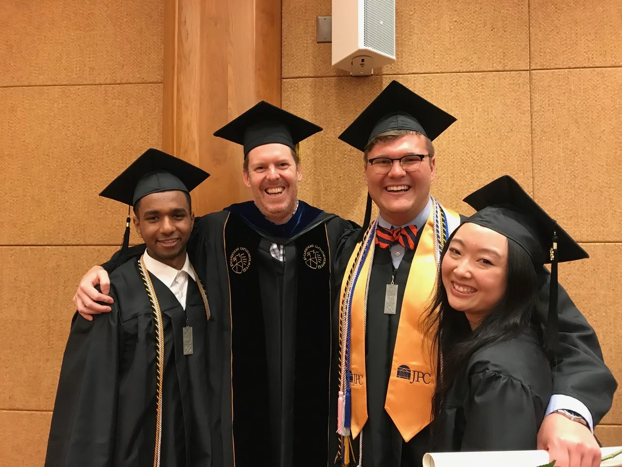 Neuroscience Undergraduate Graduation Ceremony Left to right: Joseph Ephrem, Christopher Deppmann, Parks Remcho, Lucy Jin