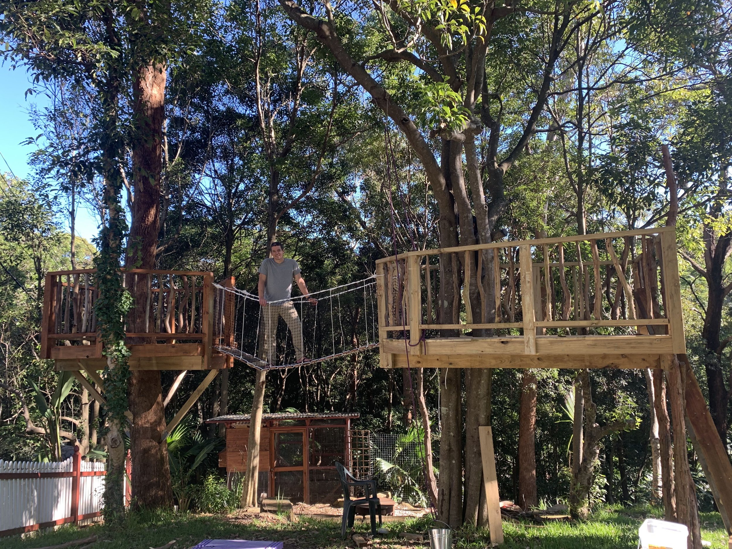 treehouse two platforms and bridge with guy.jpg