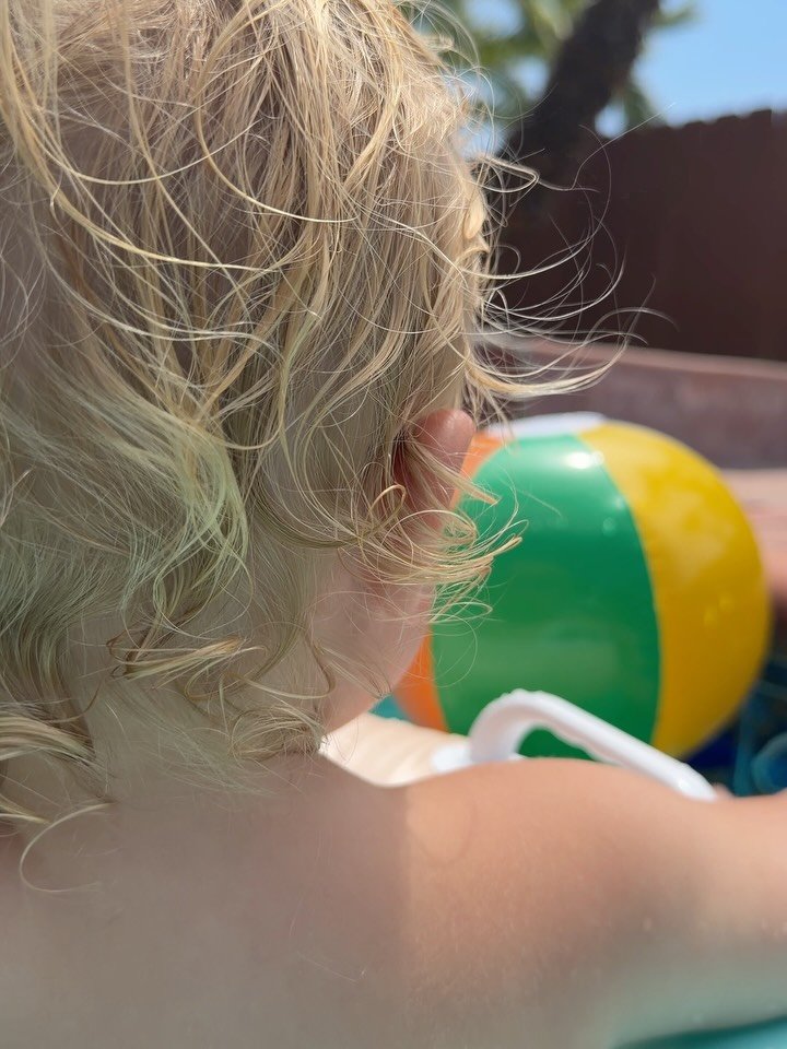 Teaching a toddler what self-care looks like. San Diego summer requires a raft and 21% Zinc Oxide ☀️