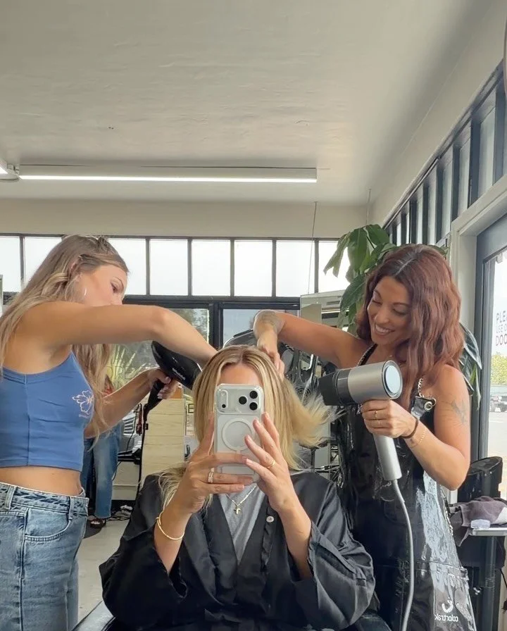 When a natural head of hair requires two blow dryers.