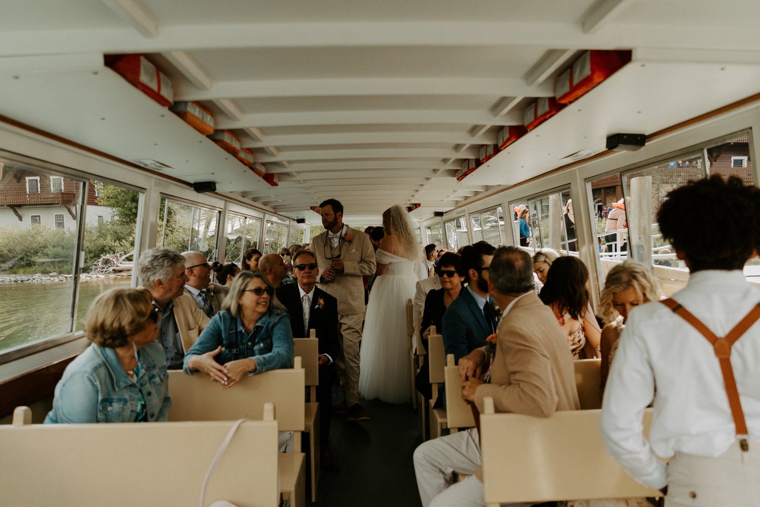 many-glacier-boat-wedding-swiftcurrent-lake-photographer-videographer-28.jpg
