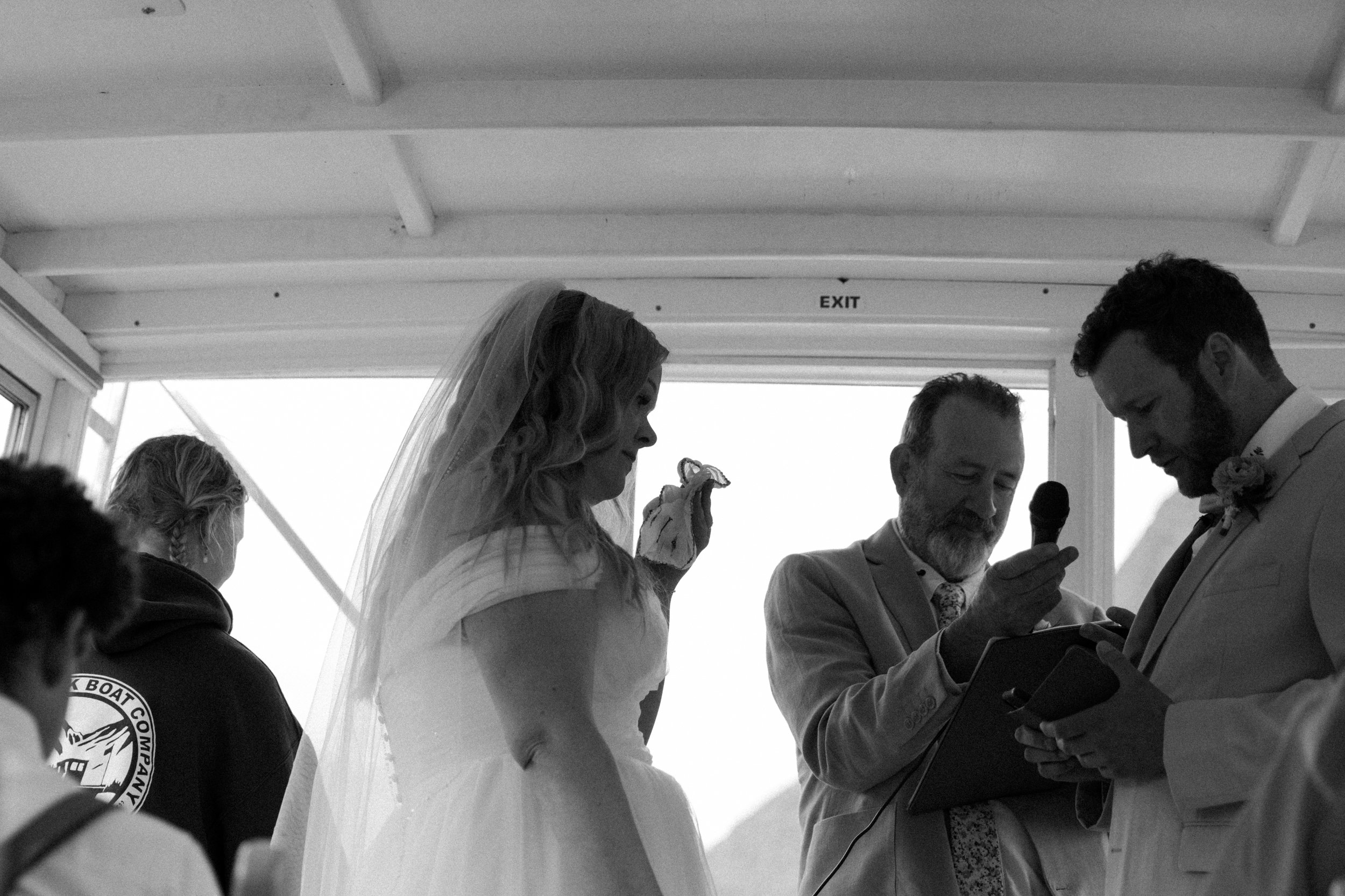 many-glacier-boat-wedding-swiftcurrent-lake-photographer-videographer-33.jpg