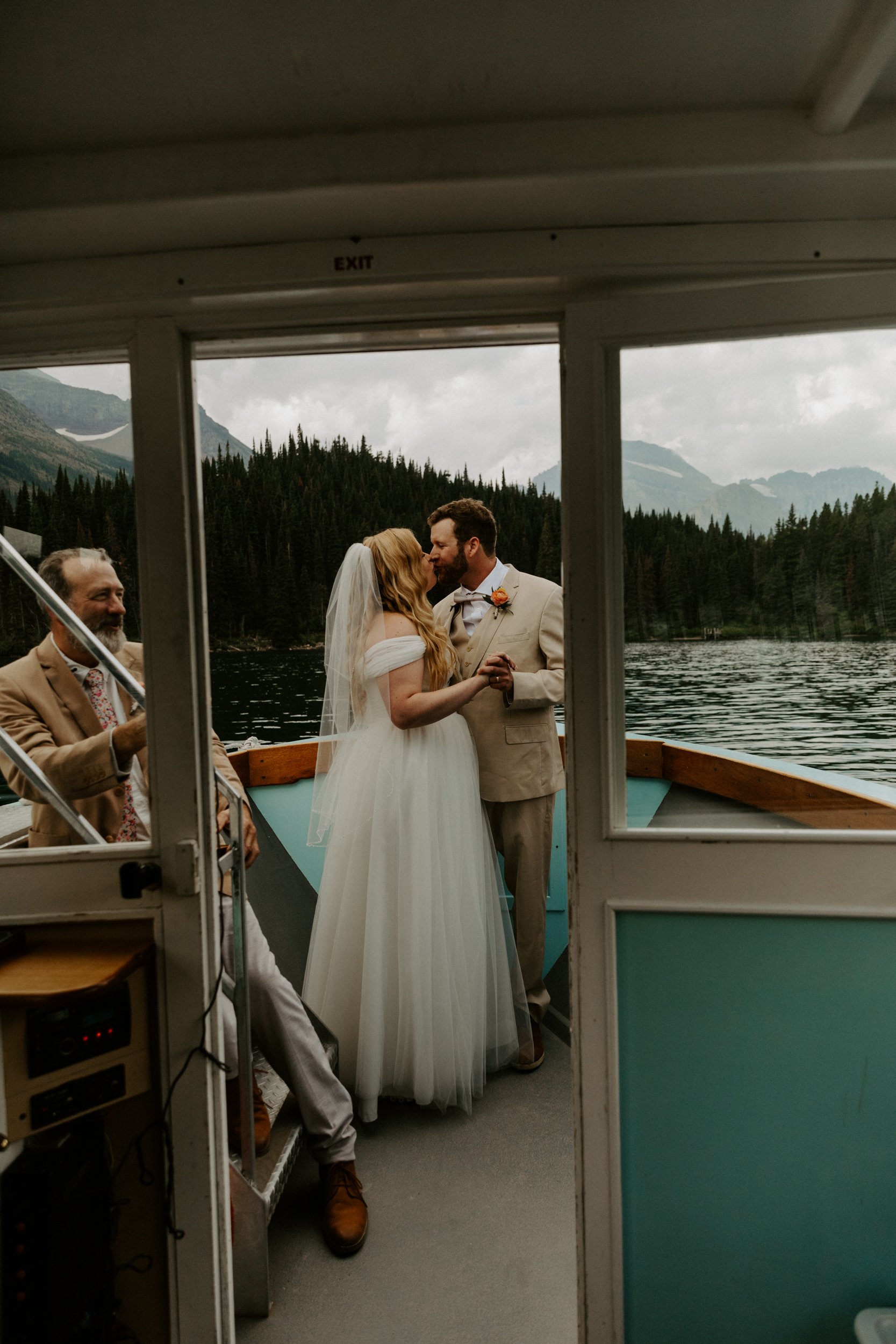 many-glacier-boat-wedding-swiftcurrent-lake-photographer-videographer-40.jpg