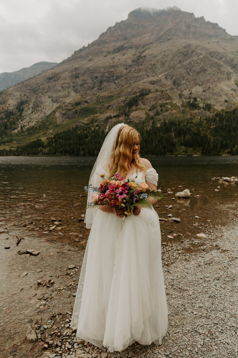 many-glacier-boat-wedding-swiftcurrent-lake-photographer-videographer-56.jpg