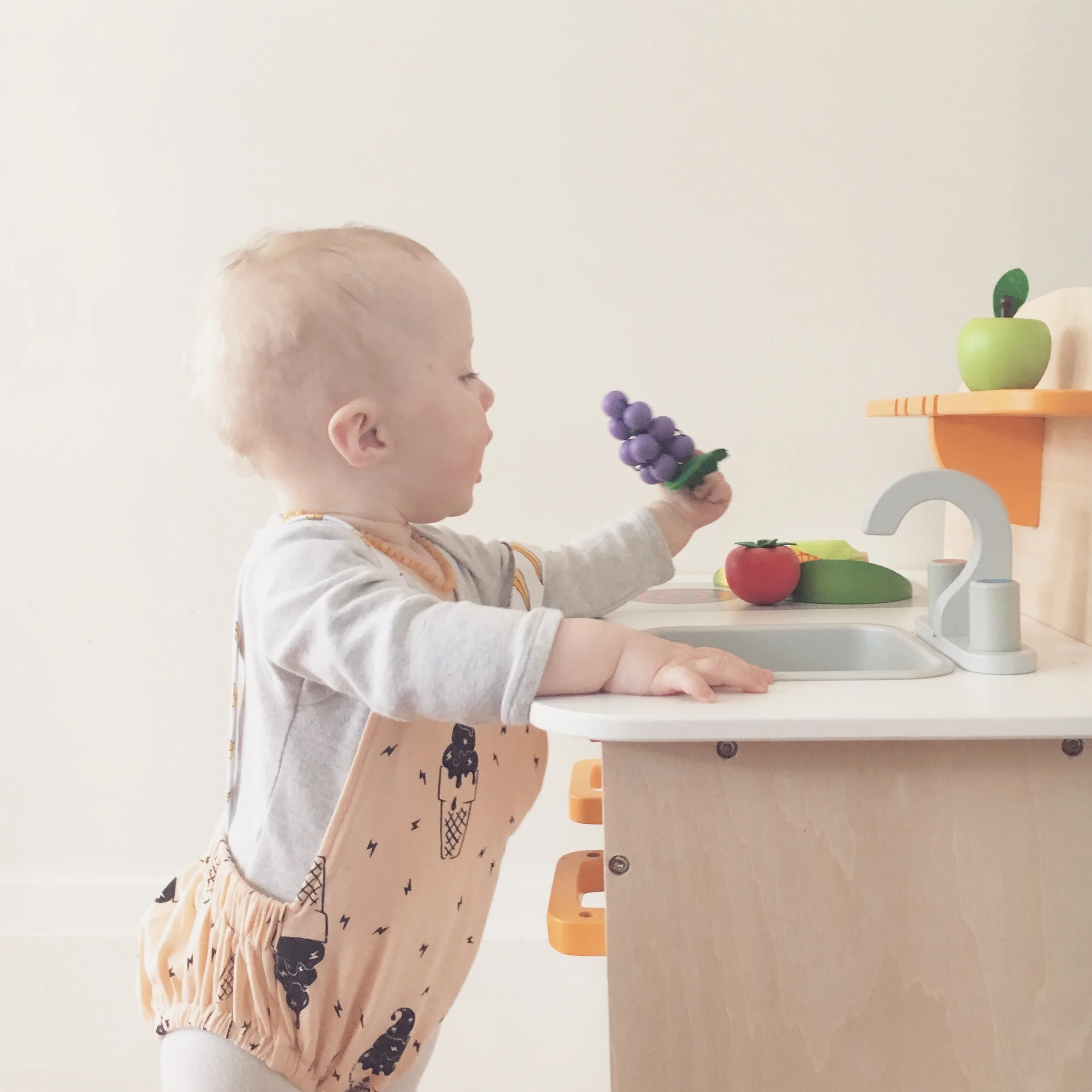 Soft Serve Romper from Kapow Kids. Wooden Fruit from Little I&O.