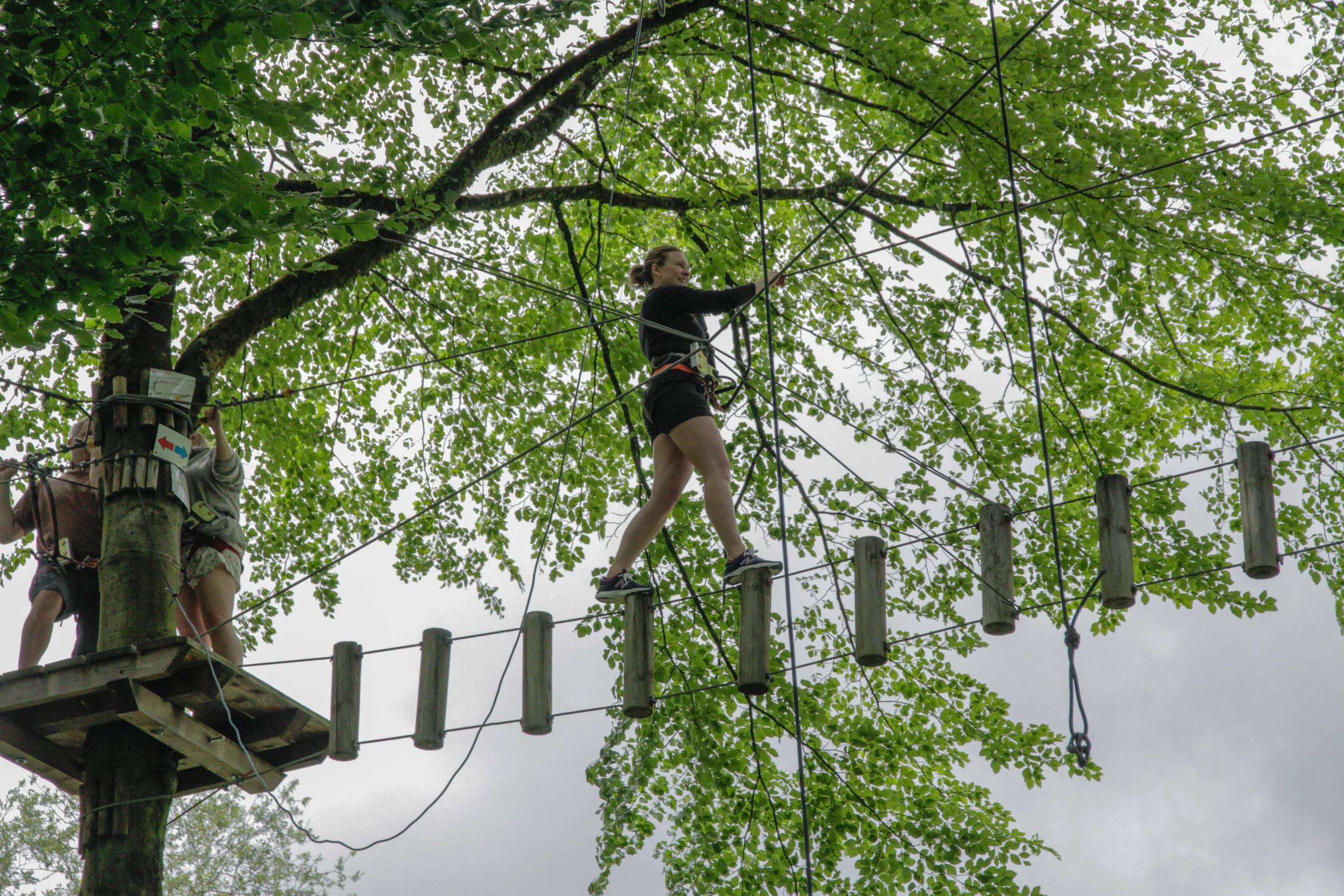 My life in the hands of two carabiners at the ropes course.