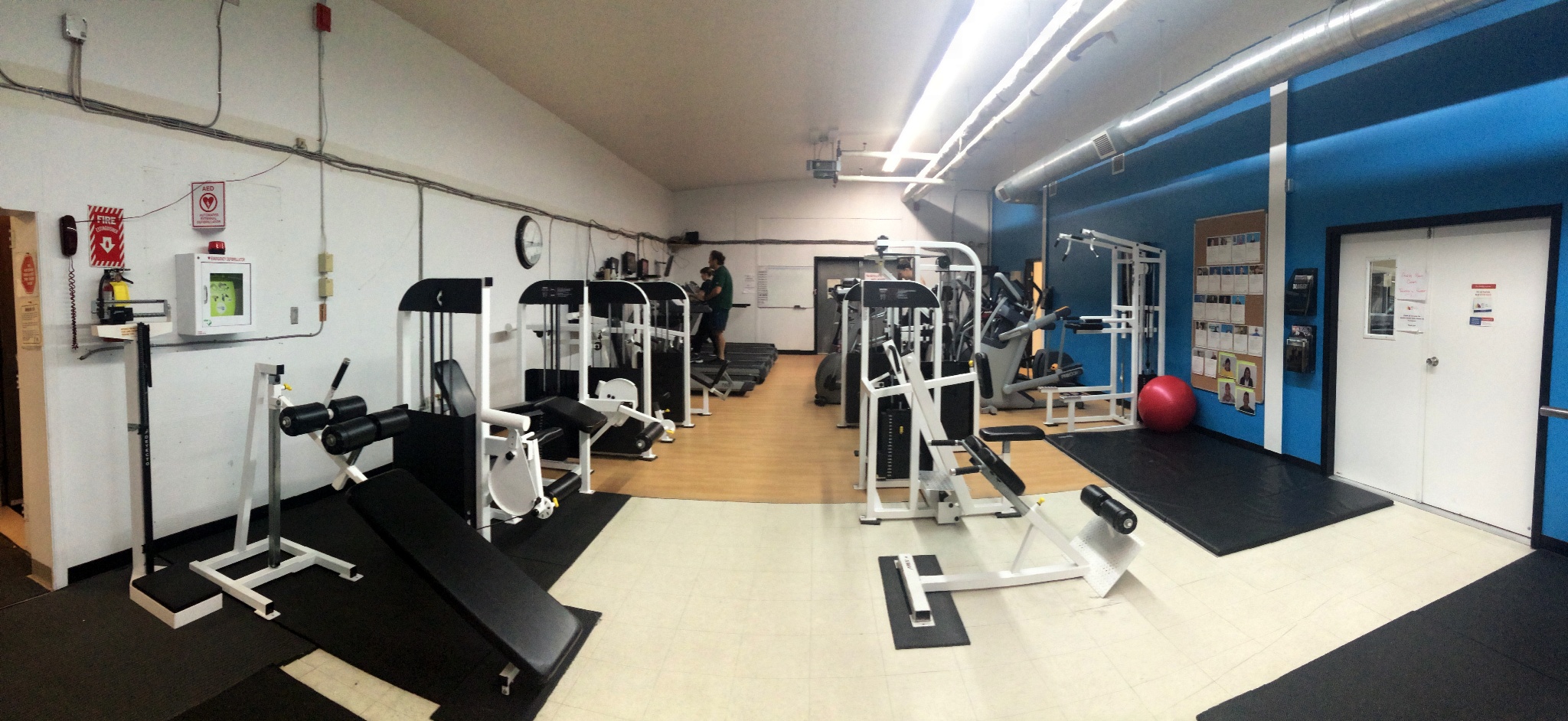 More weight equipment and cardio machines in Atii Fitness Centre's space.