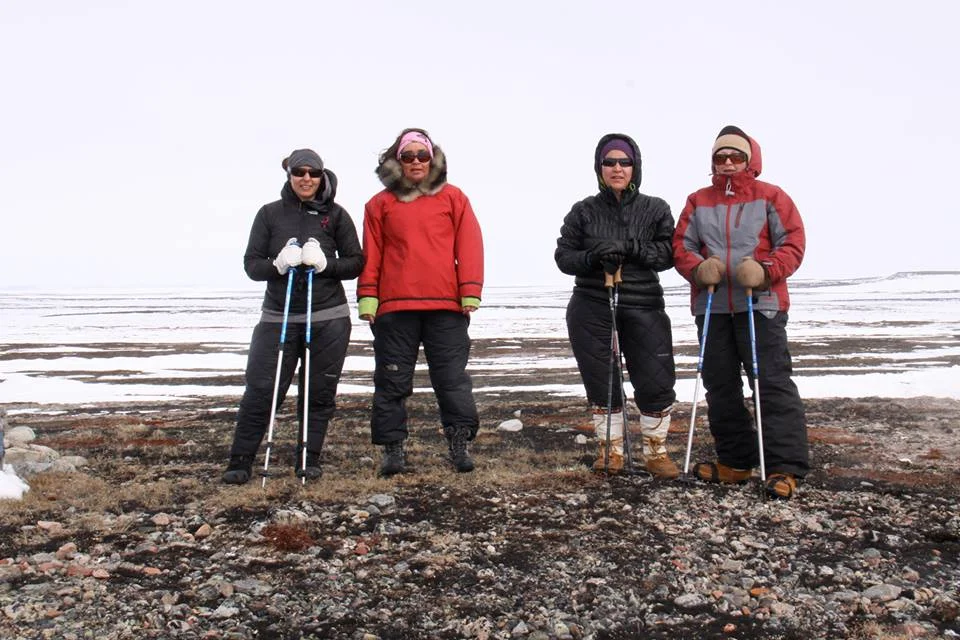 Mike, second from left, with the Women in Action, Steps for Life group that walked from Hall Beach to Igloolik to raise money for cancer research. Photo courtesy of Jesse Mike/Facebook.