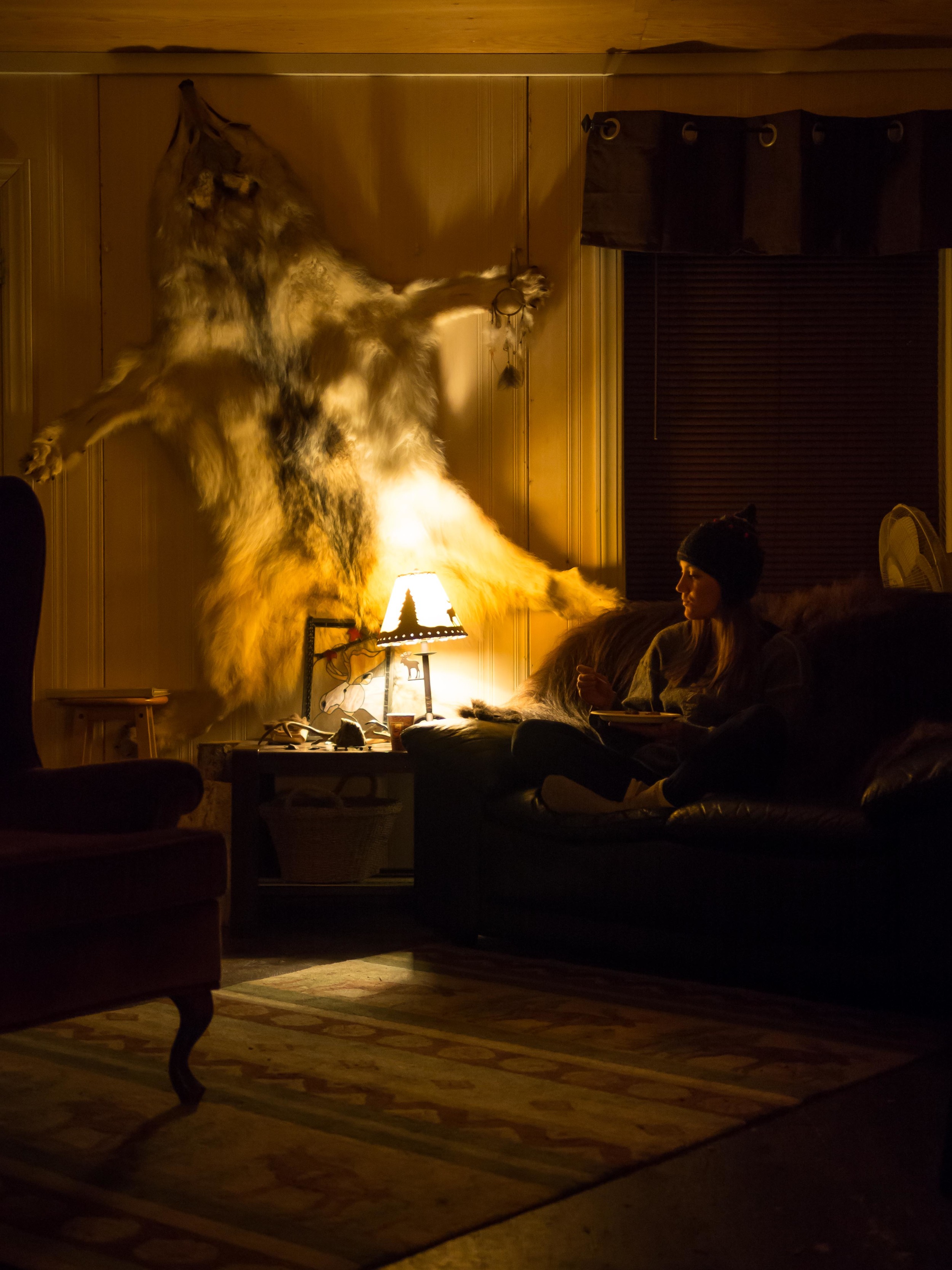 Sara enjoying a late night snack of deer meat and wild berry tea. Photo by Anubha Momin.