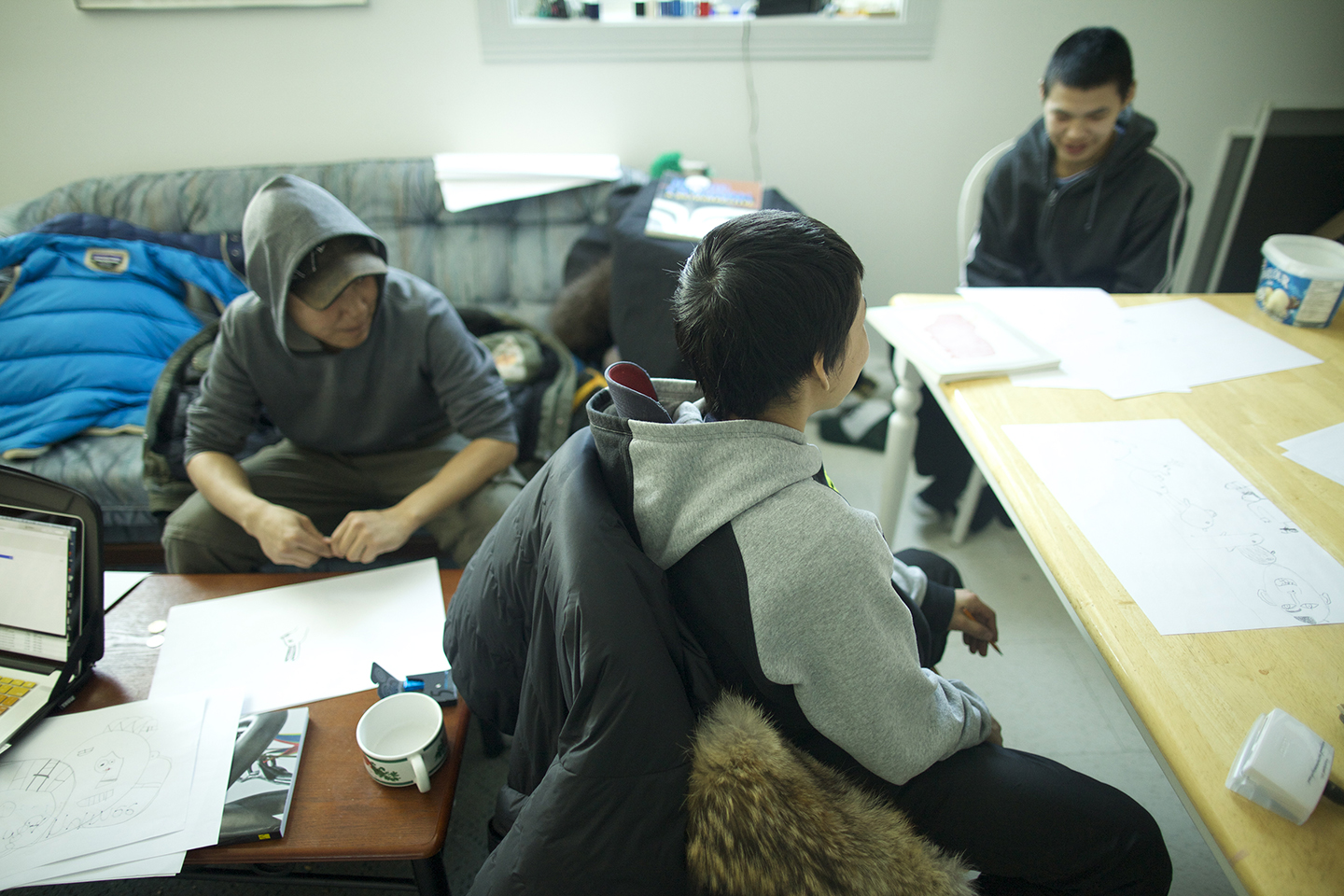 Audi, Latch, and Parr sketching in Cape Dorset. Photo by Patrick Thompson.