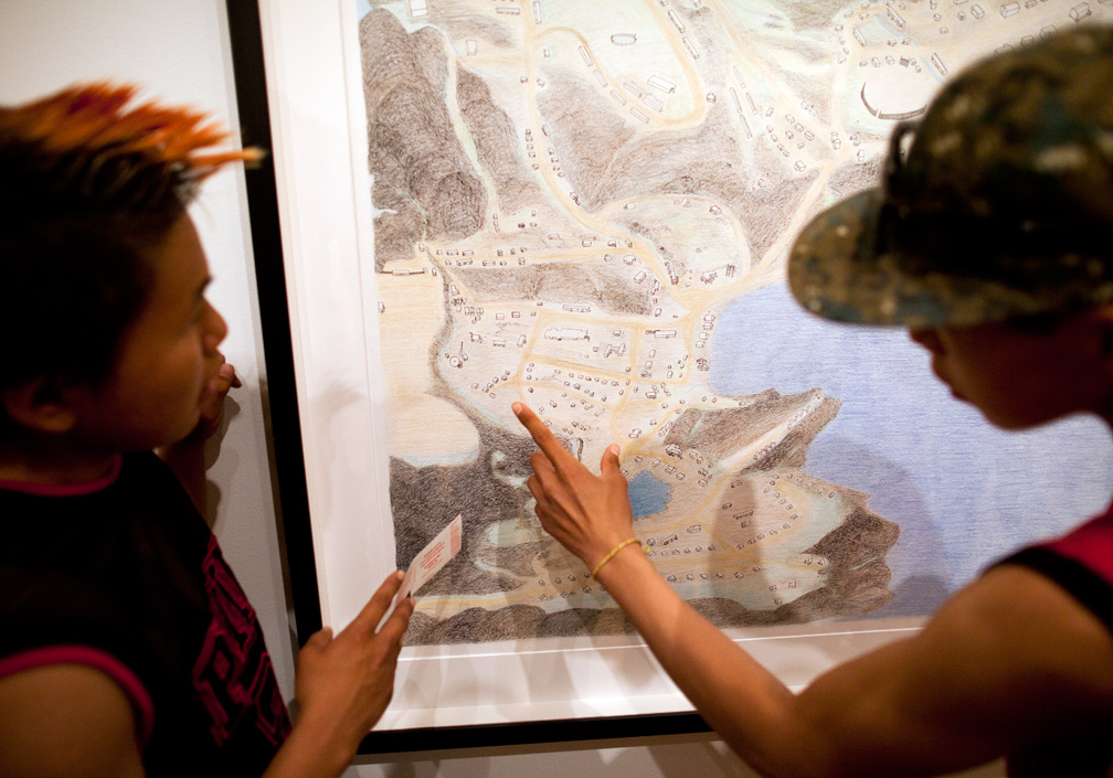 Audi and Parr locating landmarks on Shuvinai Ashoona’s “Cape Dorset from Above” (2012) at the Art Gallery of Ontario. Photo by Tobin Grimshaw.