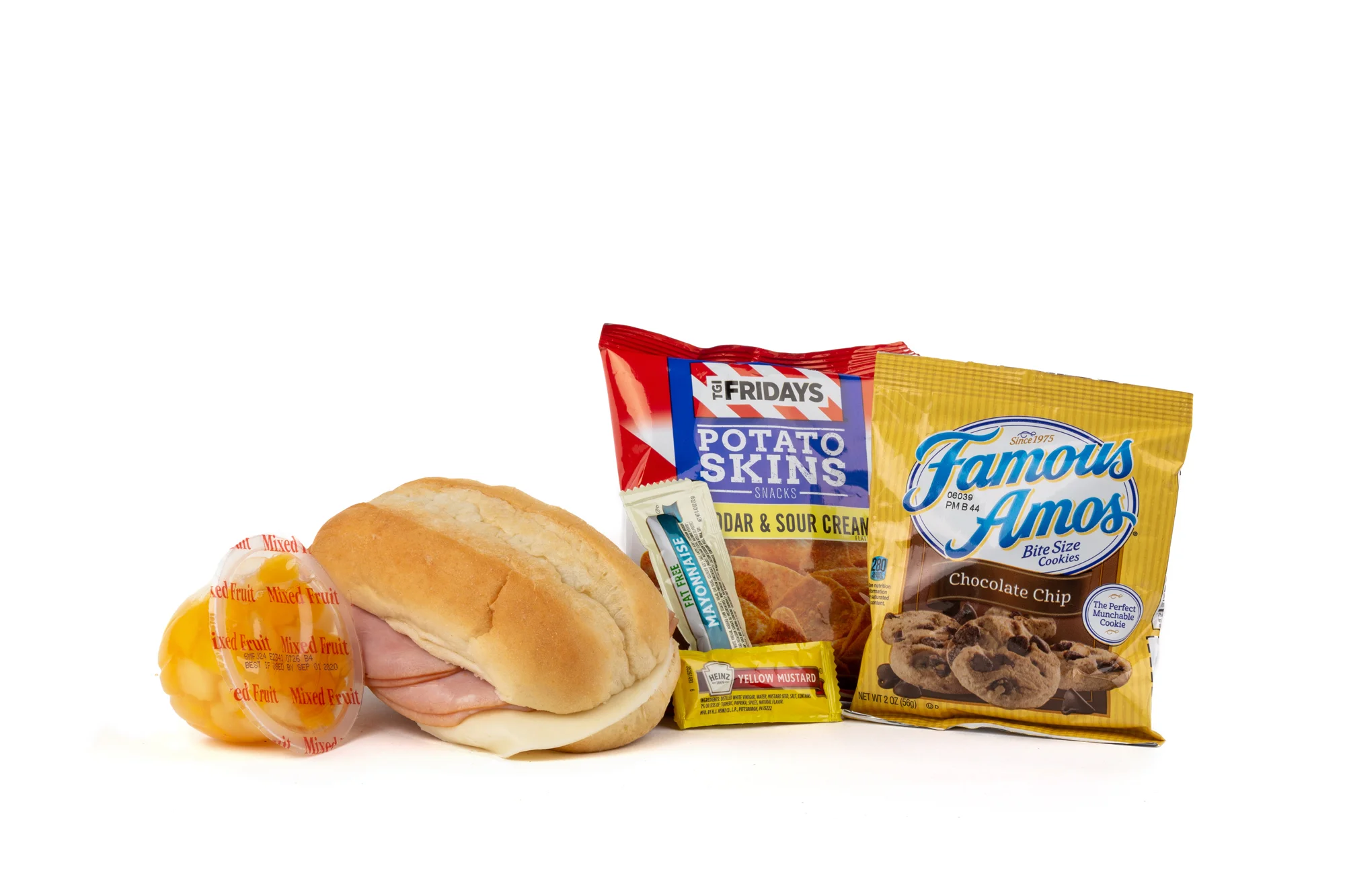 FK01ND - Ham/Provolone Sandwich - Frozen NO DRINK NAPA 894001E619559 Sandwich - Ham/Provolone on Sub Bun Frozen Chip Potato TGIF Cheddar Bacon Mixed Fruit Cup Cookie Choc Chip Famous Amos Mayonnaise Packet Fatfree Dressing Mustard Packet Candy Mint Starlight Spearmint