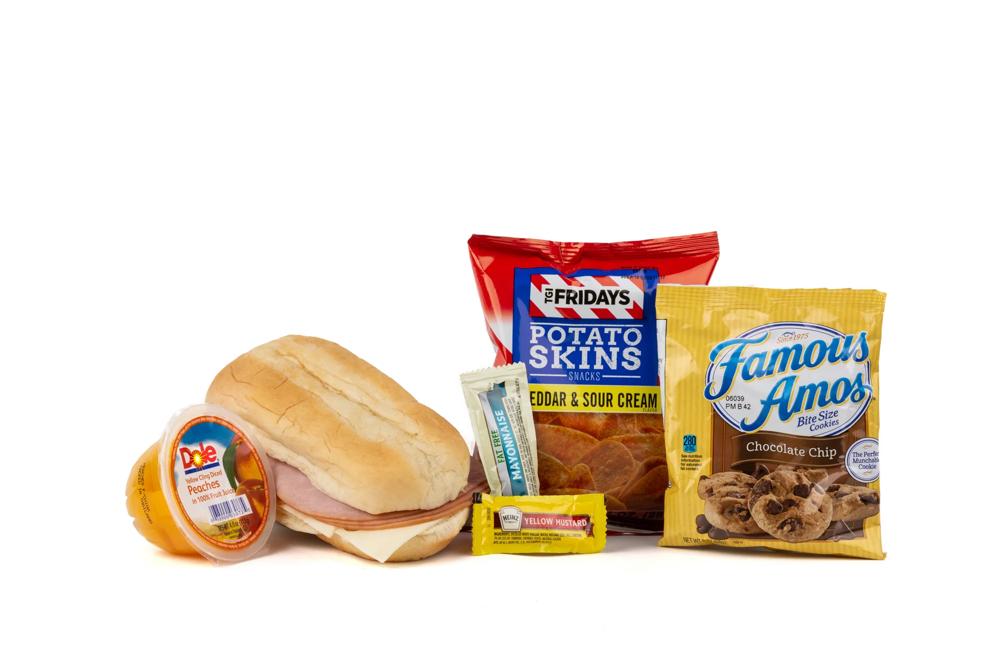 FK06ND Ham & Swiss Sandwich - Frozen NO DRINK NAPA 894001E619560 Sandwich - Ham & Swiss on Sub Bun Frozen Chip Potato TGIF Cheddar Sour Cream Diced Peach Cup Cookie Choc Chip Famous Amos Mayonnaise Packet Fatfree Dressing Mustard Packet Candy Mint Starlight Spearmint