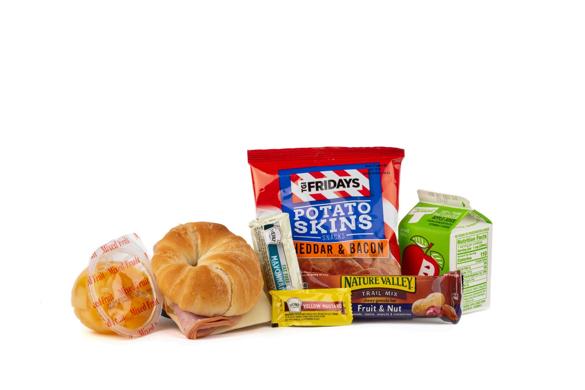 MK06 - Fresh Ham/Swiss/Croissant Smoked Ham and Swiss on Croissant TGIF Potato Chips Granola Bar Fruit Nut Mustard Packet Mayonnaise Packet Fat Free Mixed Fruit Cup Apple Juice