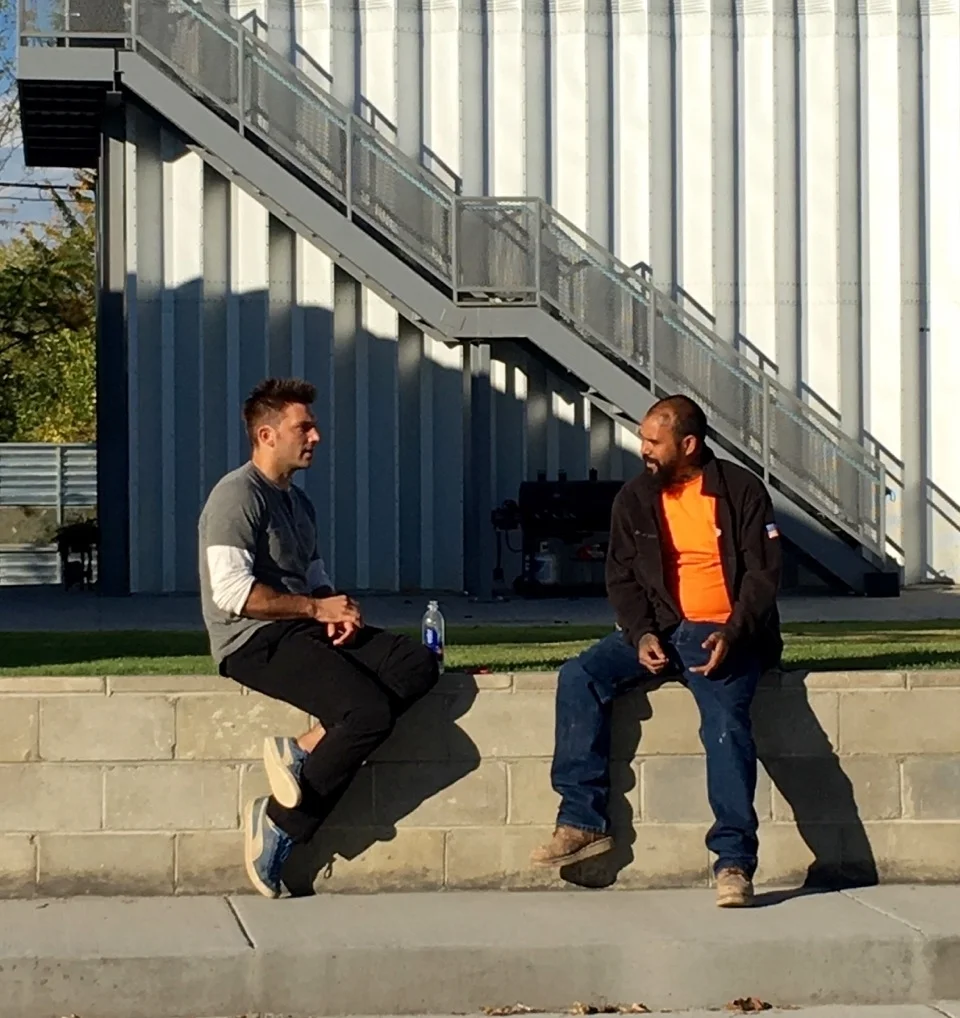 PK and VC devising a game-plan on the “stoop” of True North.
