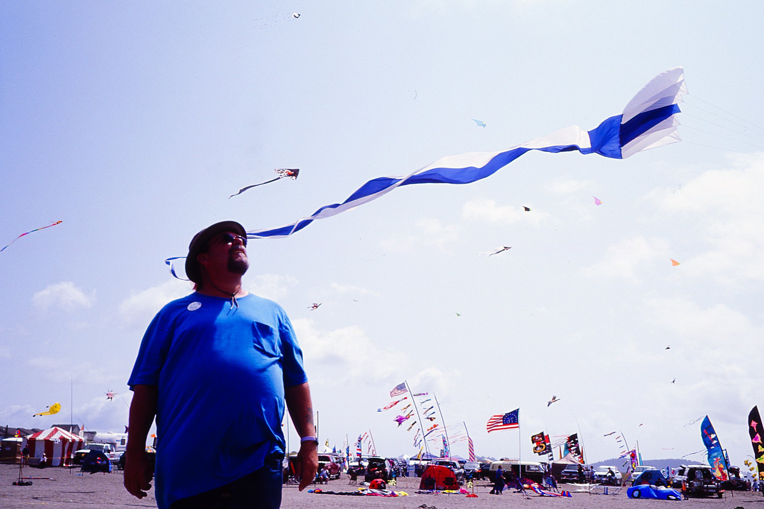 Man with kite blue shirt.jpg