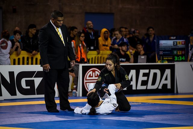 Maureen (in the black gi) competing at the 2017 Pans.