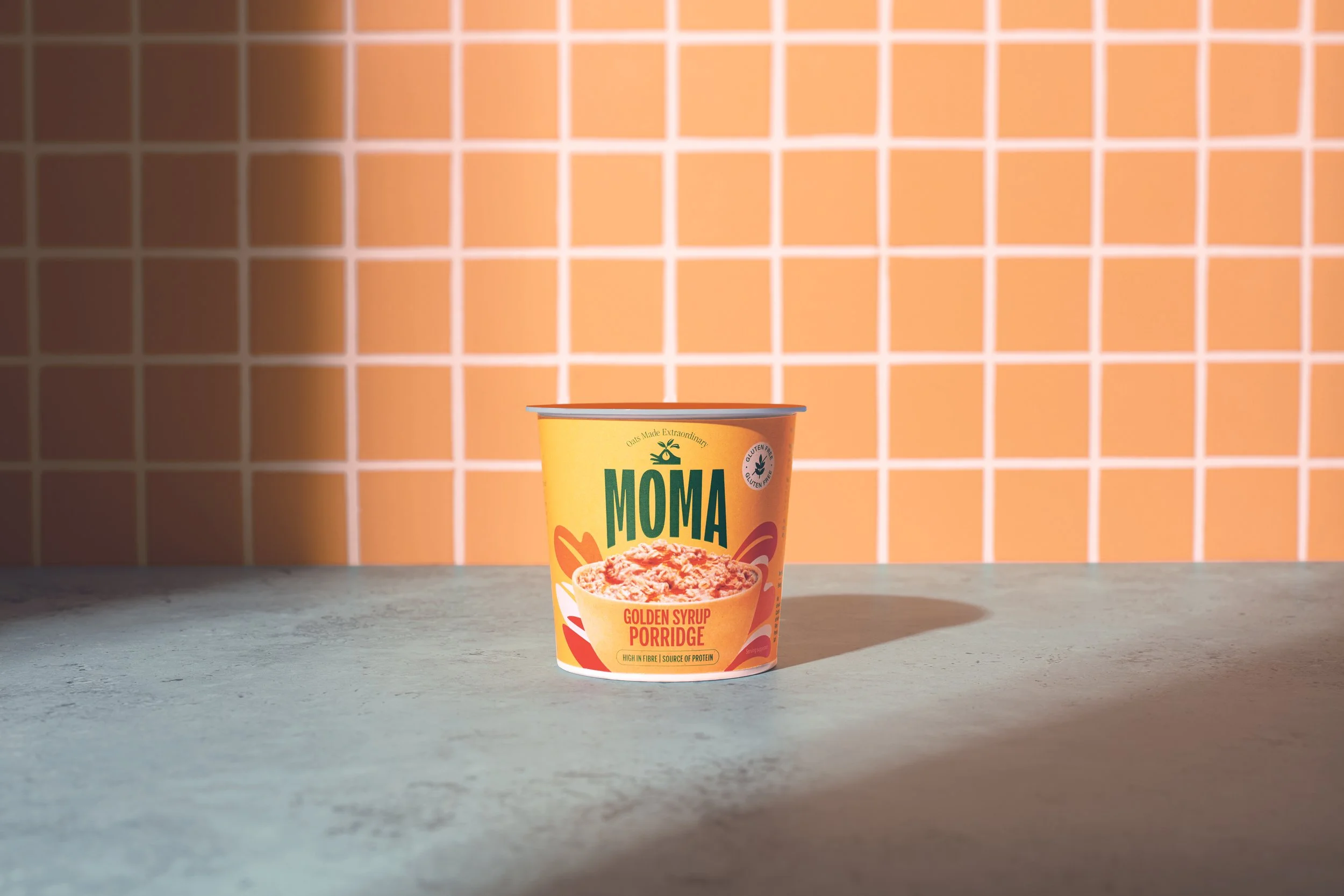 MOMA_Porridgepots_Golden_Syrup_Single_on_Orange copy.jpg