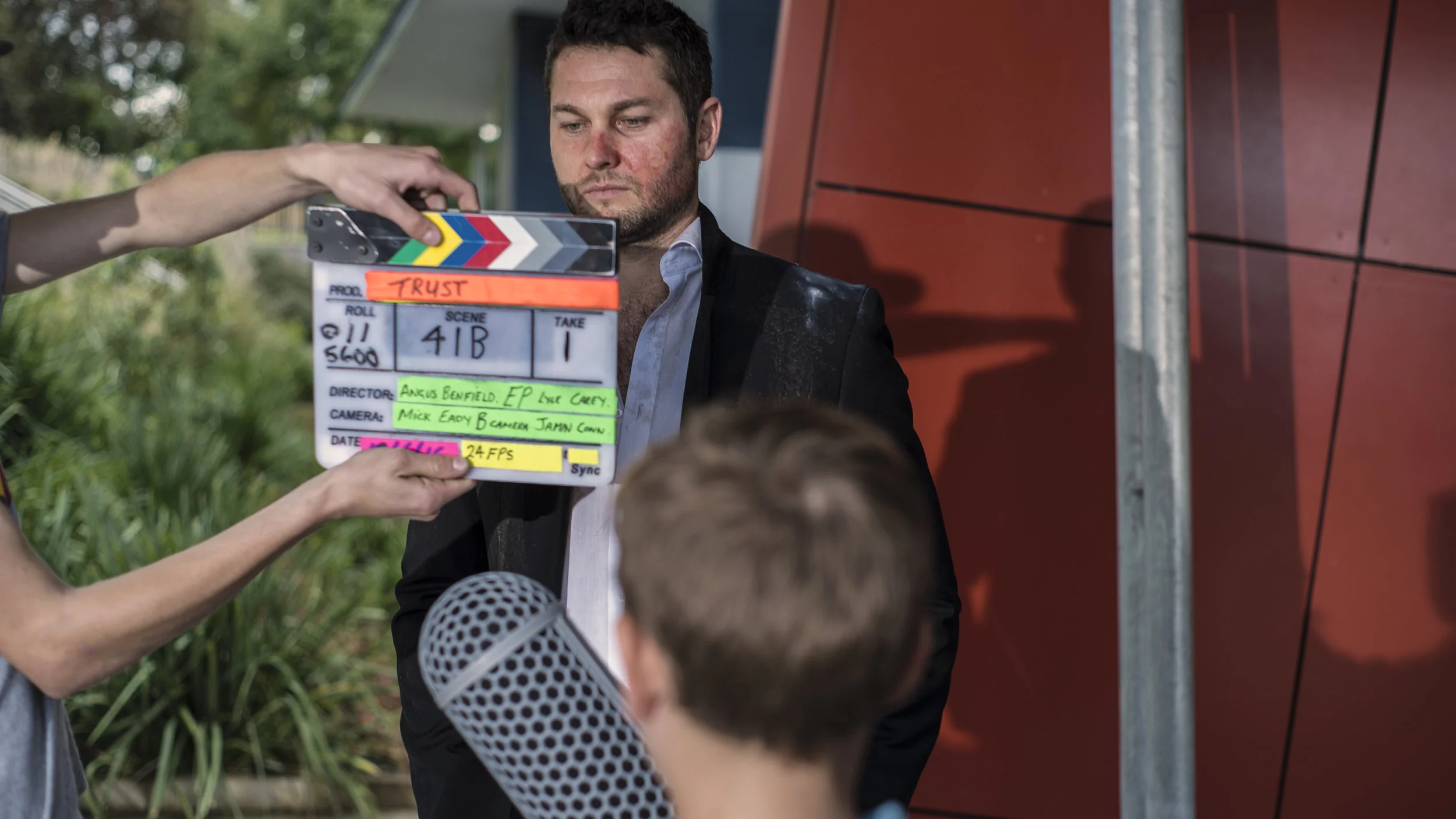 Our second AC (Assistant Camera Operator) marking the shot before a take. 