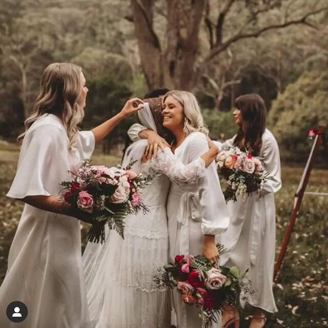 Exactly what your girl gang are for ❤️ One of our favourite wedding days is now live on @hellomaymagazine 🥰 Go check out all the magic from Ellie and Nathan&rsquo;s big day! 
Photography @thepaperfox 
Wearing @amy_new 
Florals by @aisleofeden
Make u