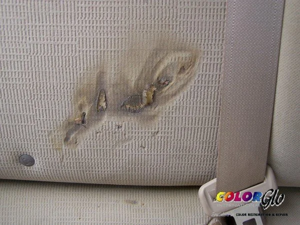 Before Image of burnt and torn fabric.