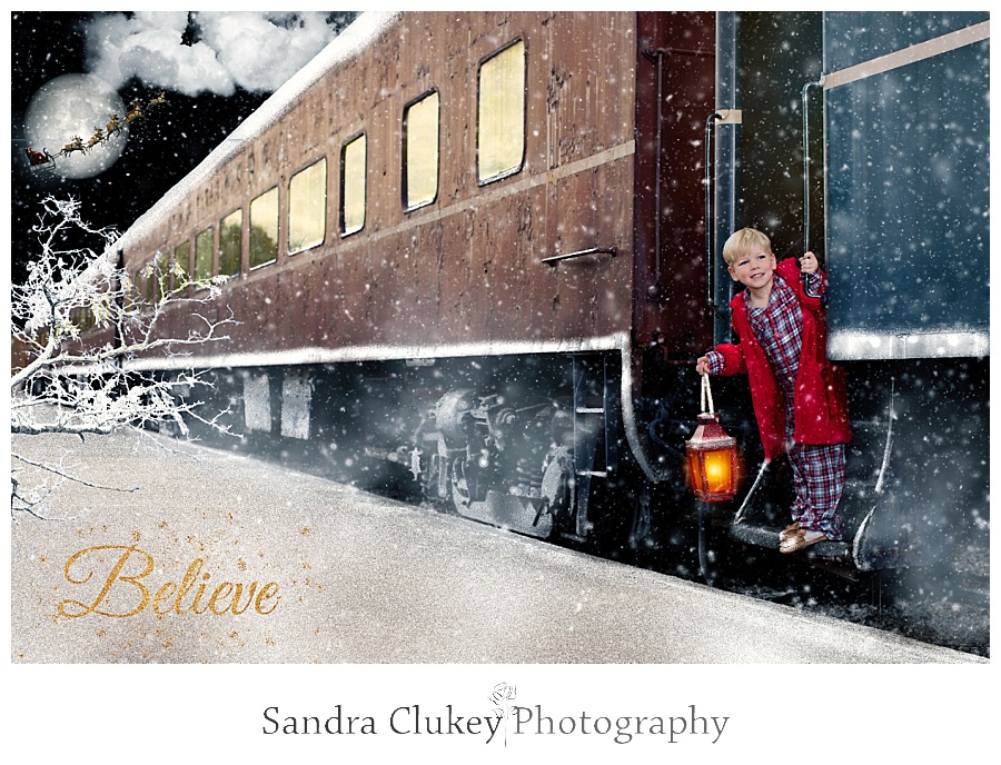 Boy on train with Santa and moon